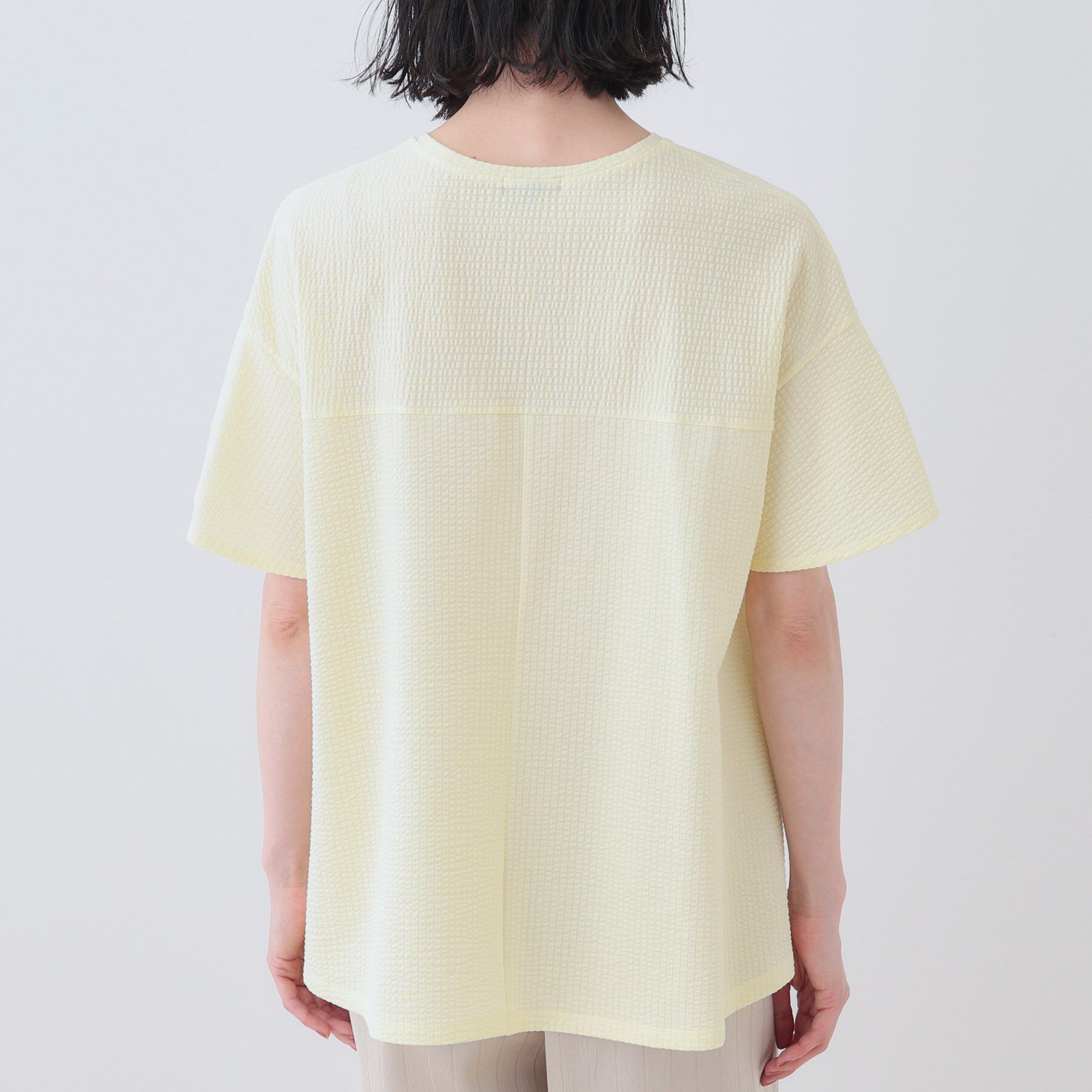 INDIVI「【洗える／体型カバー】凹凸素材フレアデザイントップス」|Tシャツ・カットソー|