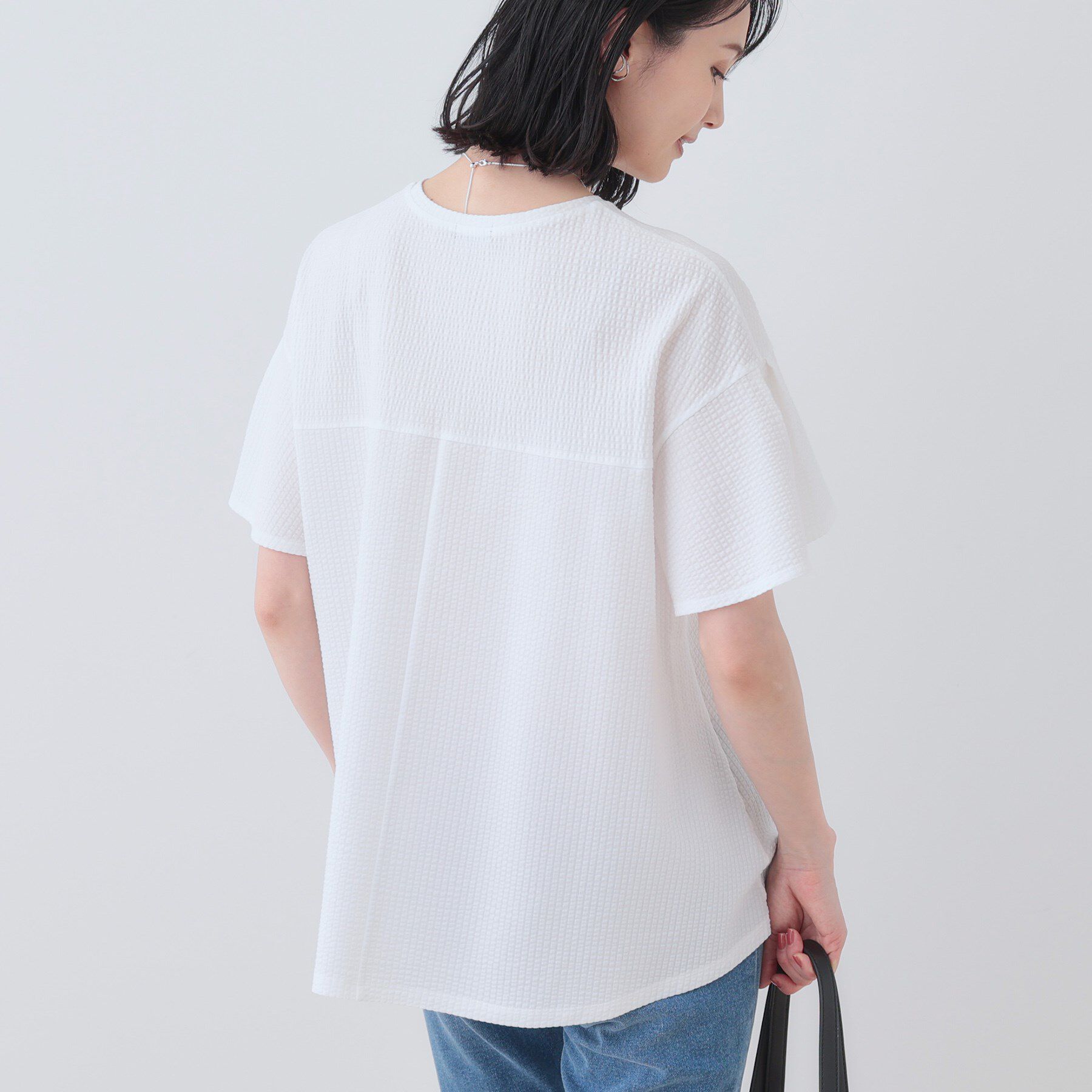 INDIVI「【洗える／体型カバー】凹凸素材フレアデザイントップス」|Tシャツ・カットソー|