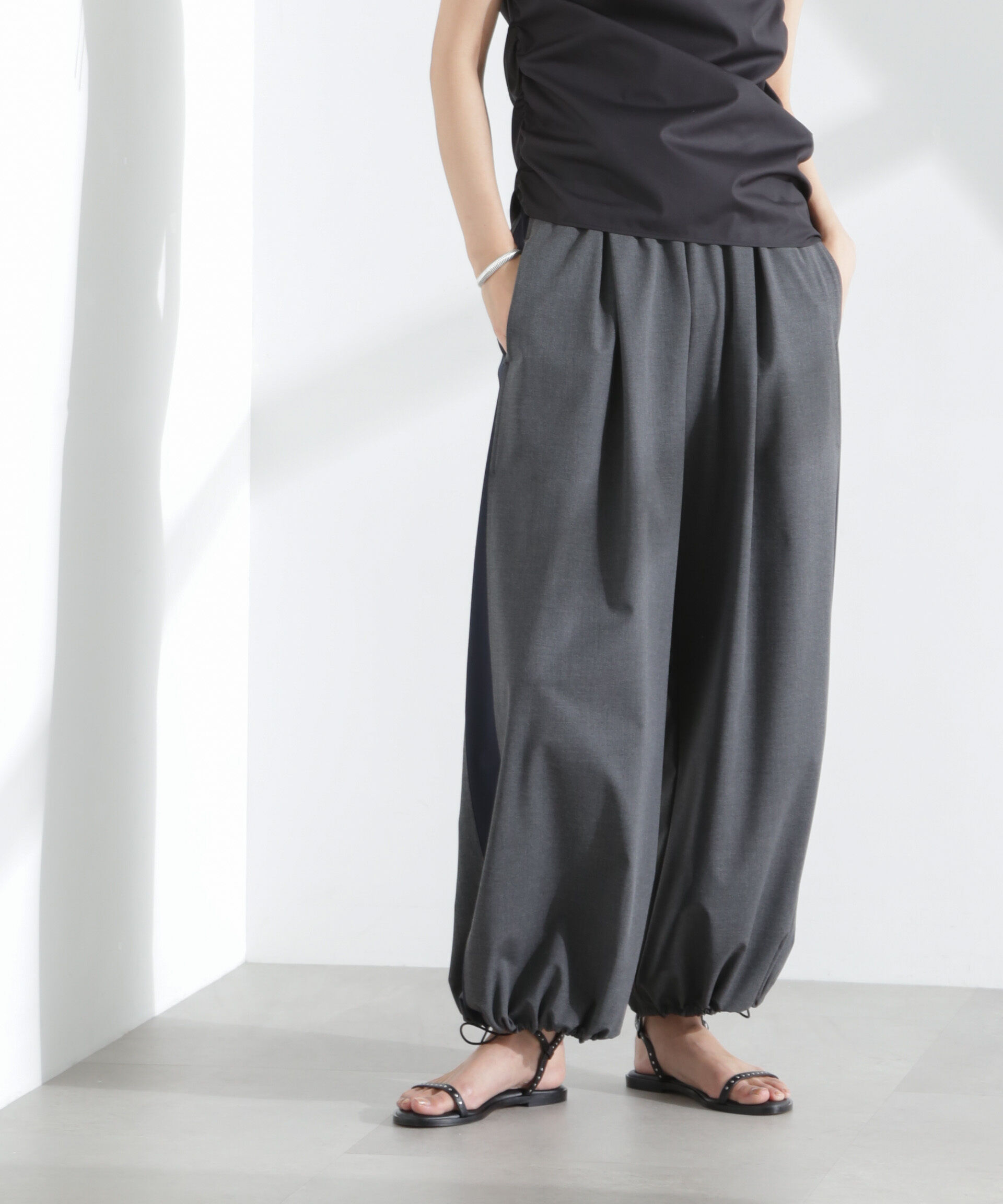 nano･universe「ラインイージーワイドパンツ」|チノ|