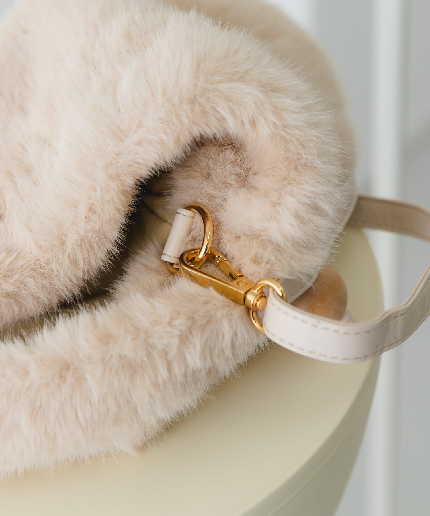 RODE SKO「ウッドボールキンチャクファーバッグ」|スカート|