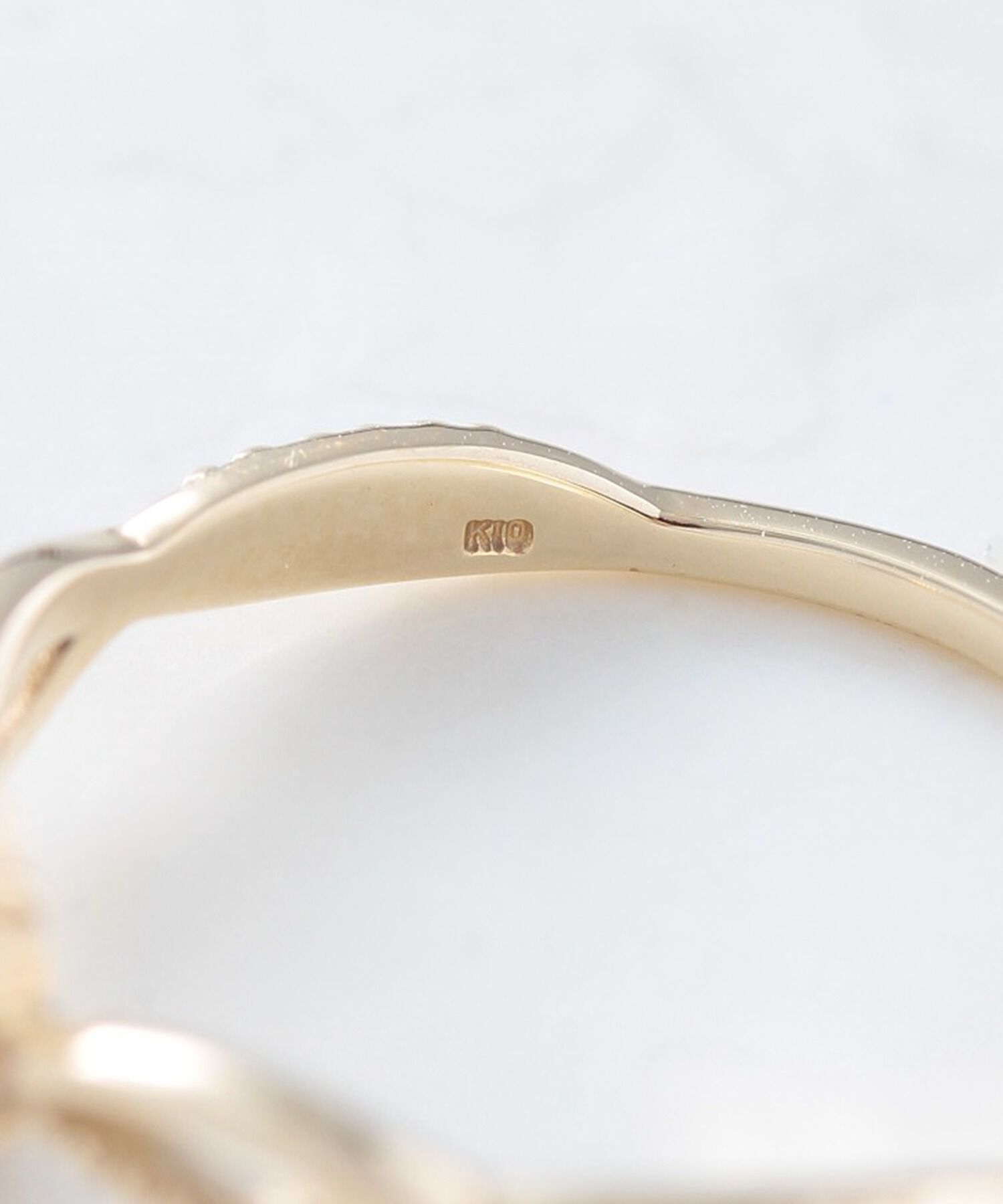 NOIR DE POUPEE「K10 タンザナイトPS クロスライン リング」|リング|