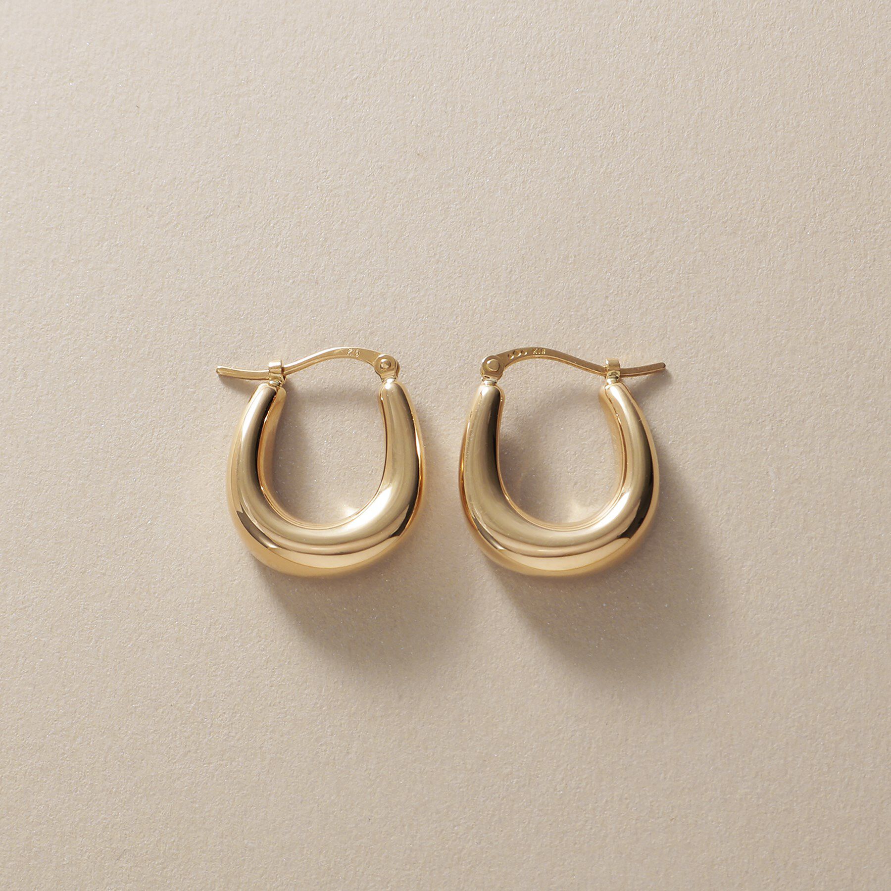 COCOSHNIK「K10中空カーブ フープピアス」|ピアス|