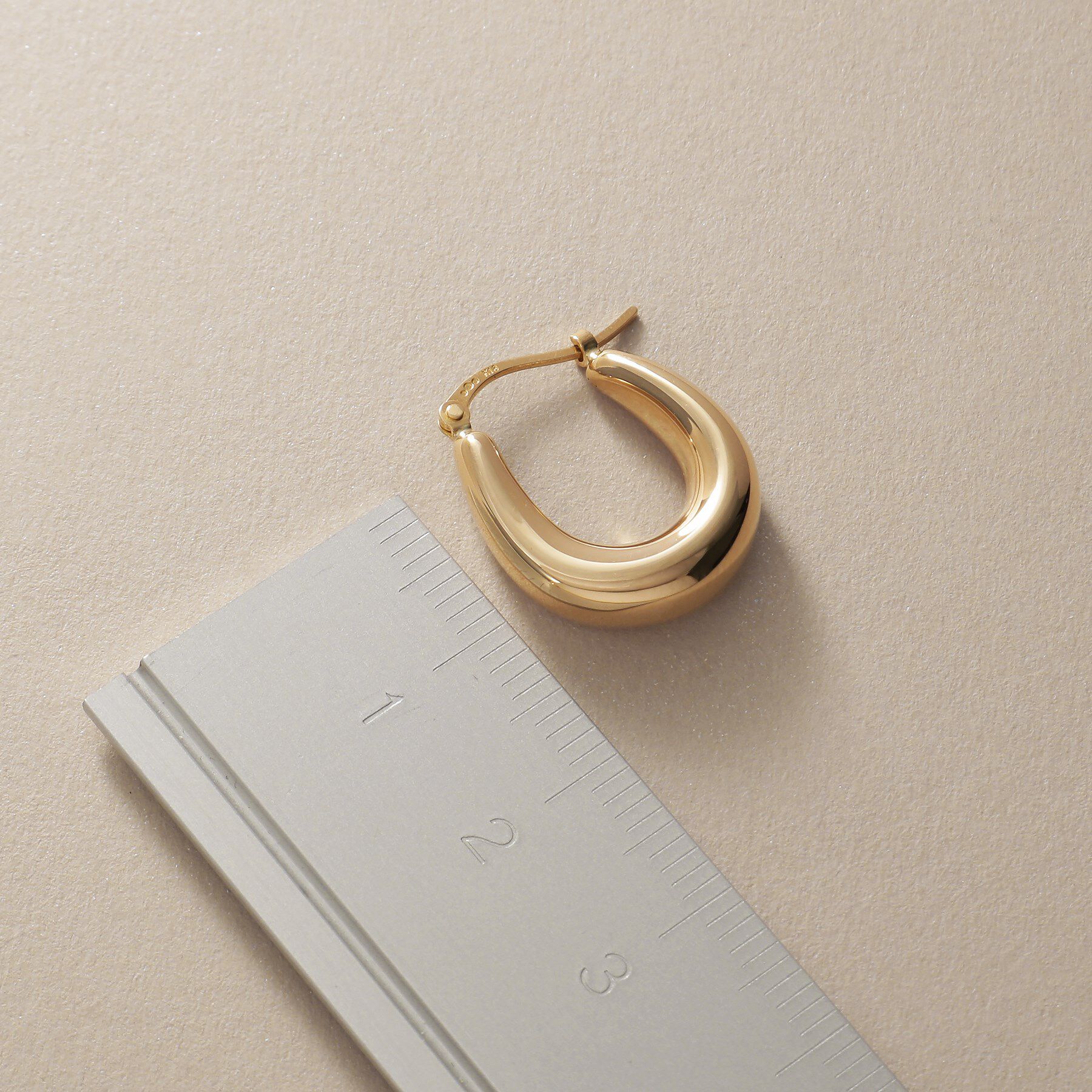 COCOSHNIK「K10中空カーブ フープピアス」|ピアス|