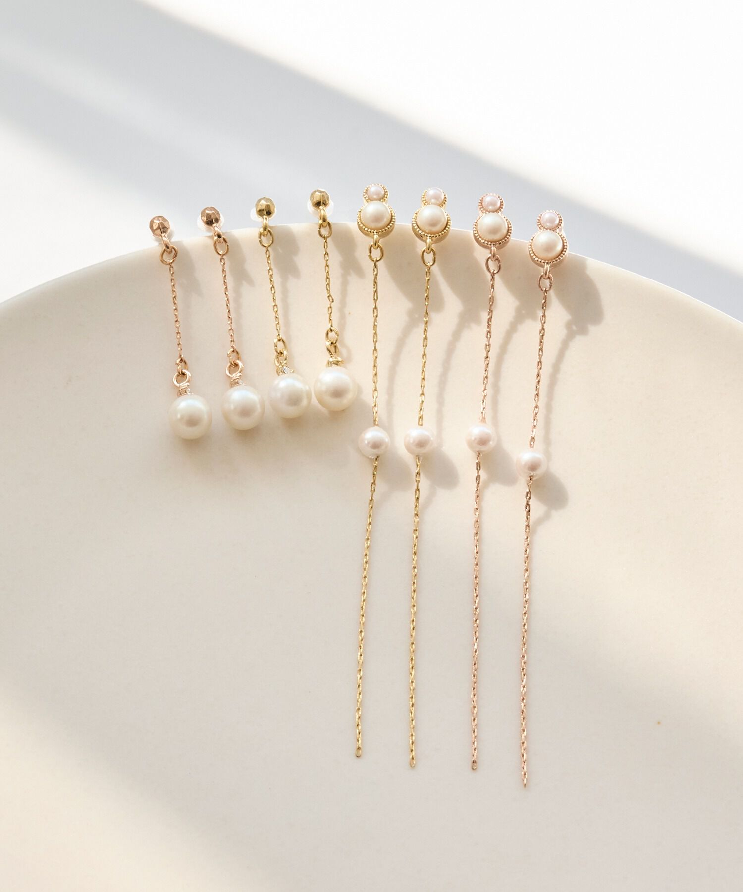 Phoebe「【金属アレルギー対応】ルミナスパールロングセラミックピアス　シャンパンゴールド」|ピアス|