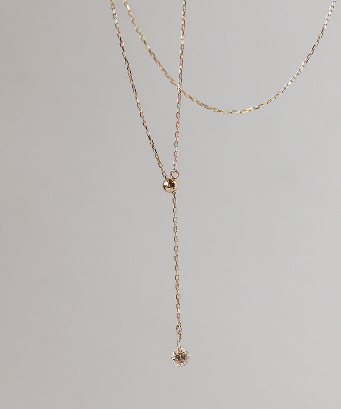  「1石 シャンパンダイヤモンド 0.1ct ムーブチェーン ネックレス | K10YG 〈ヌーディー〉」|ネックレス|