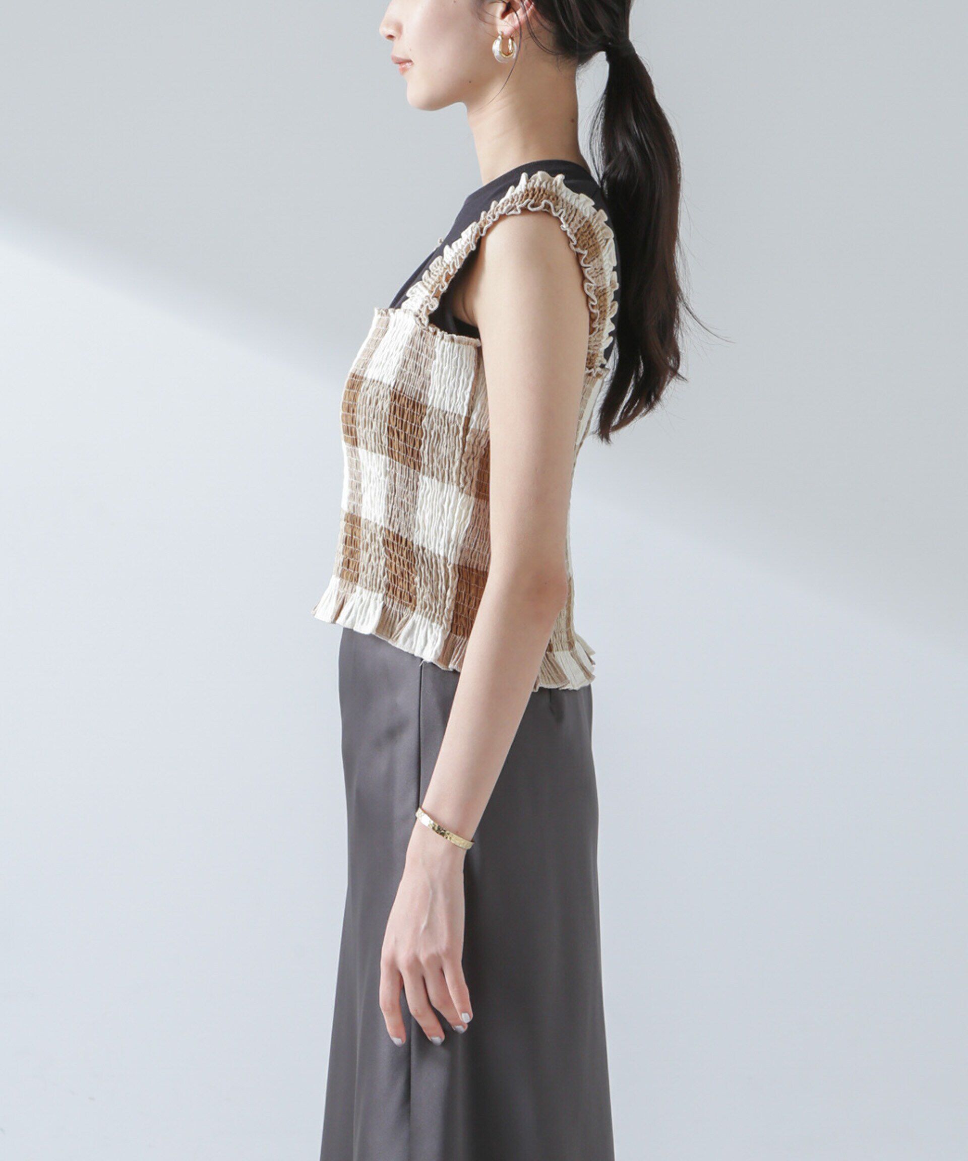 nano･universe「RITA ROW/Checkered smocked body top」|ダウンベスト・ベスト|