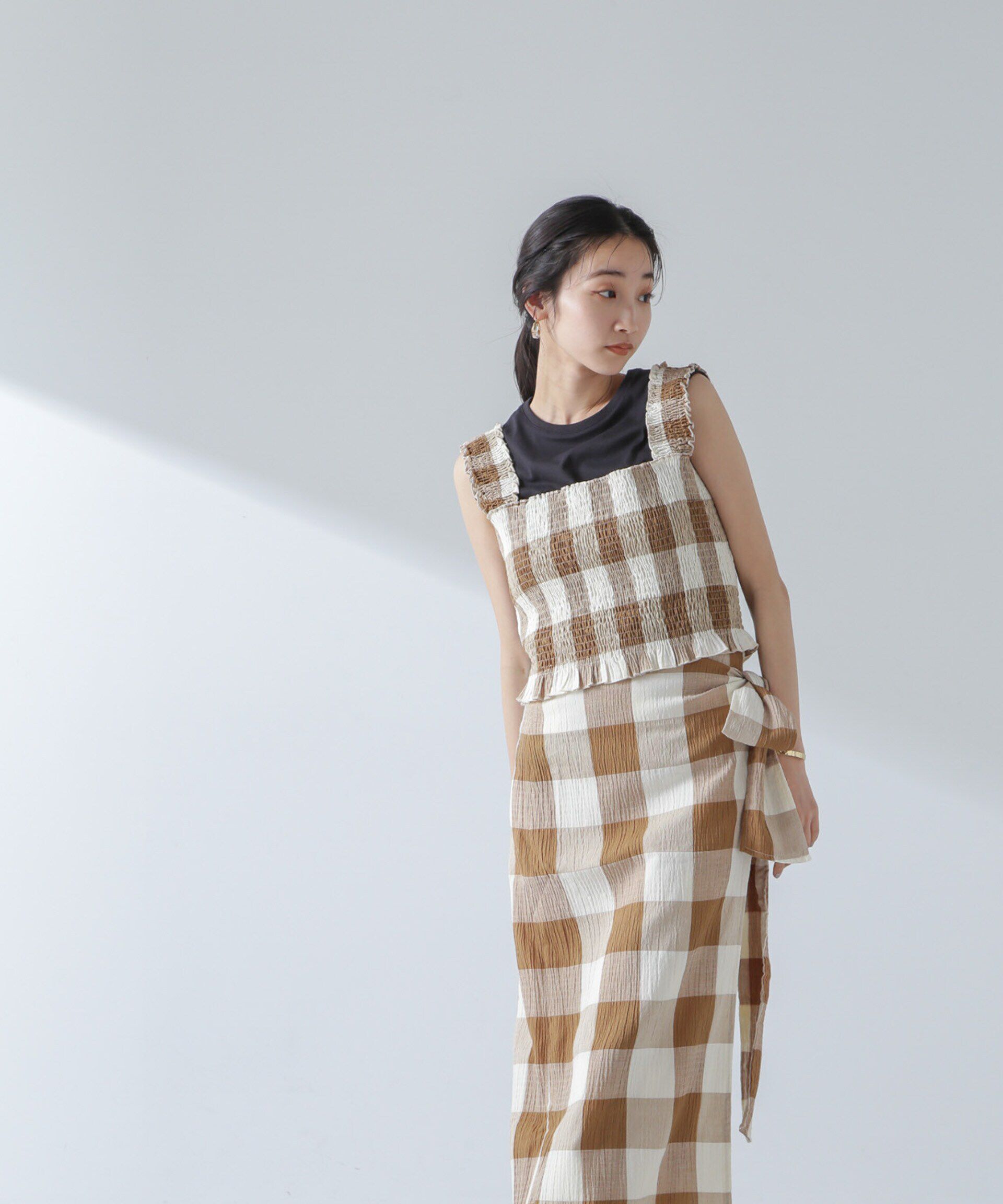 nano･universe「RITA ROW/Checkered smocked body top」|ダウンベスト・ベスト|