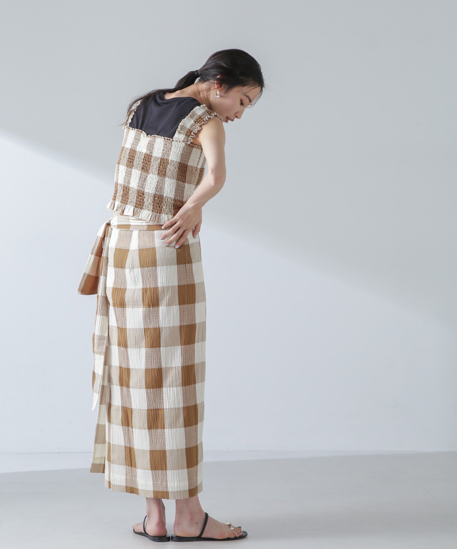 nano･universe「RITA ROW/Checkered smocked body top」|ダウンベスト・ベスト|