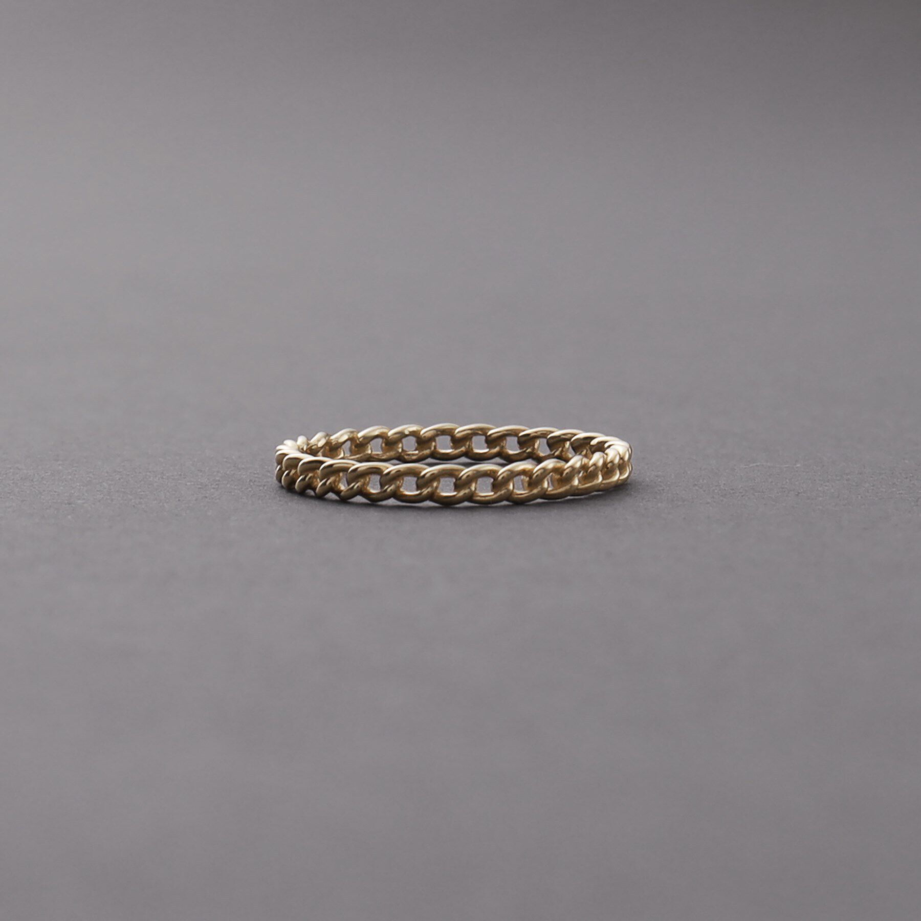 COCOSHNIK ONKITSCH「K10スキニーピンキーリング カーブチェーンモチーフ」|リング|