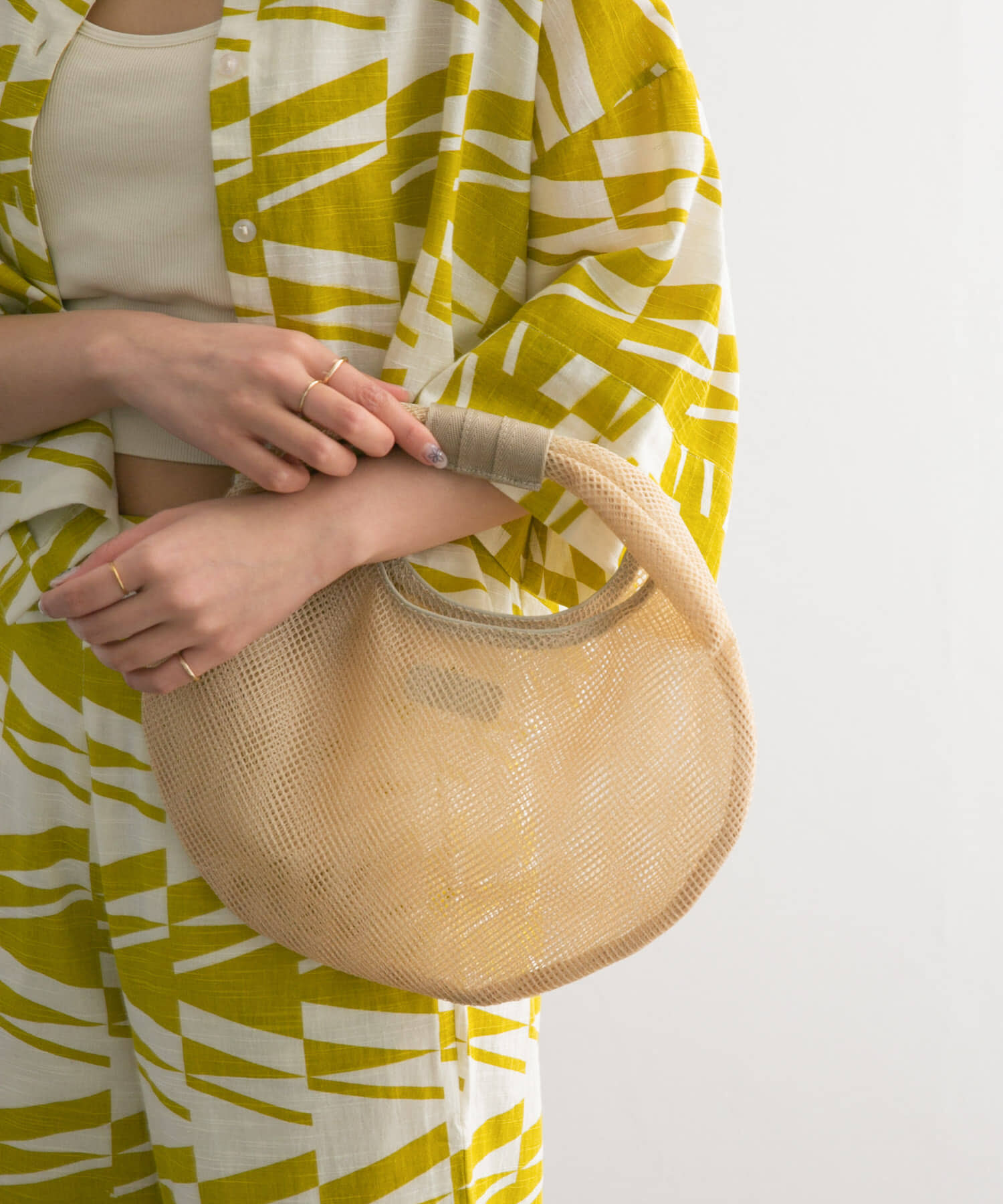  「CONTROL FREAK　メッシュラウンドバッグ」|ハンドバッグ|ベージュ