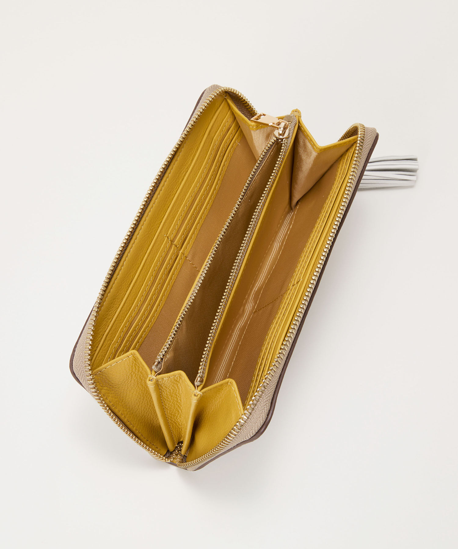 TOPKAPI TREASURE「【TREASURE TOPKAPI】シュリンクレザー タッセル プリント ラウンド 長財布」|財布|