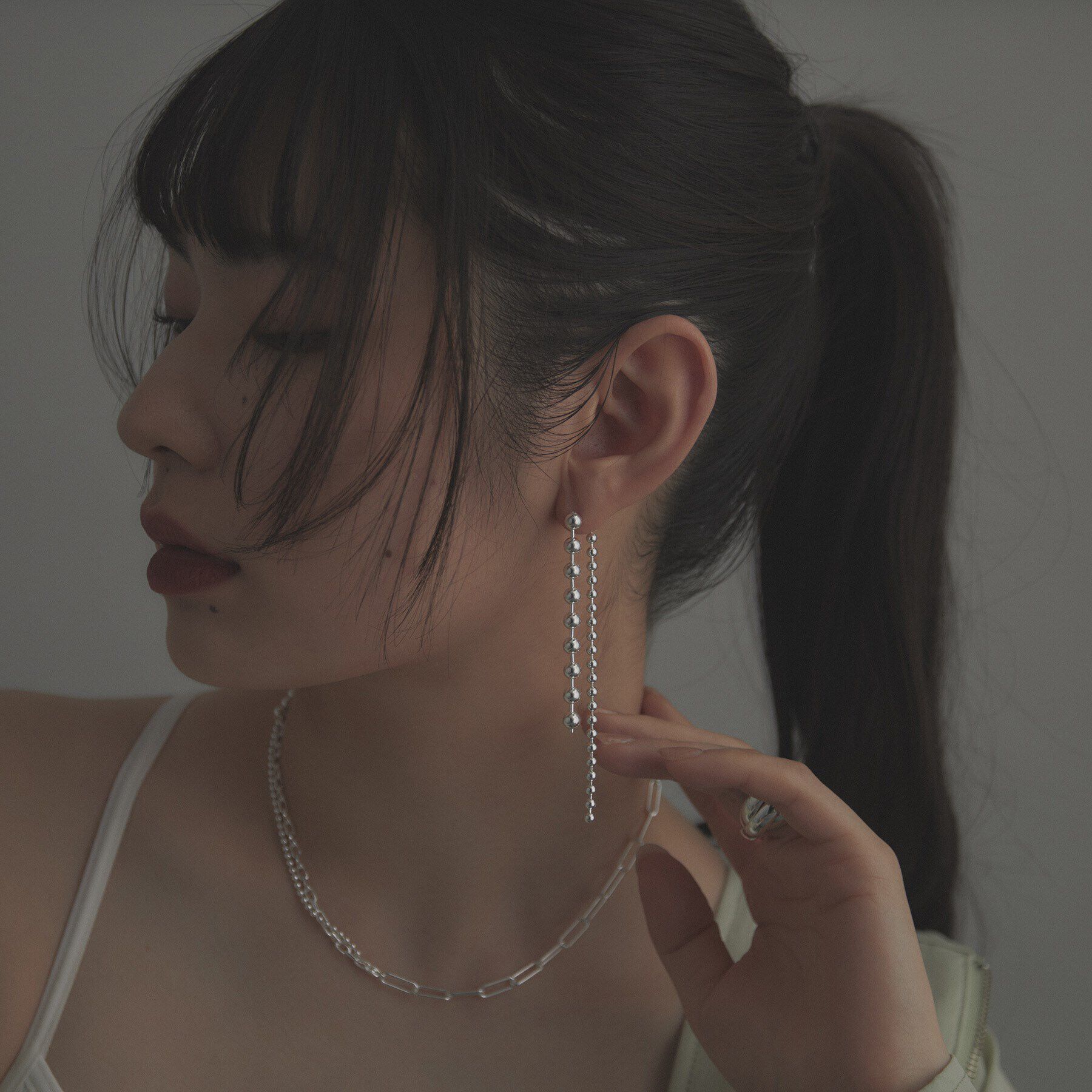 COCOSHNIK ONKITSCH「シルバー チェーンピアス ボール フロントバック」|ピアス|