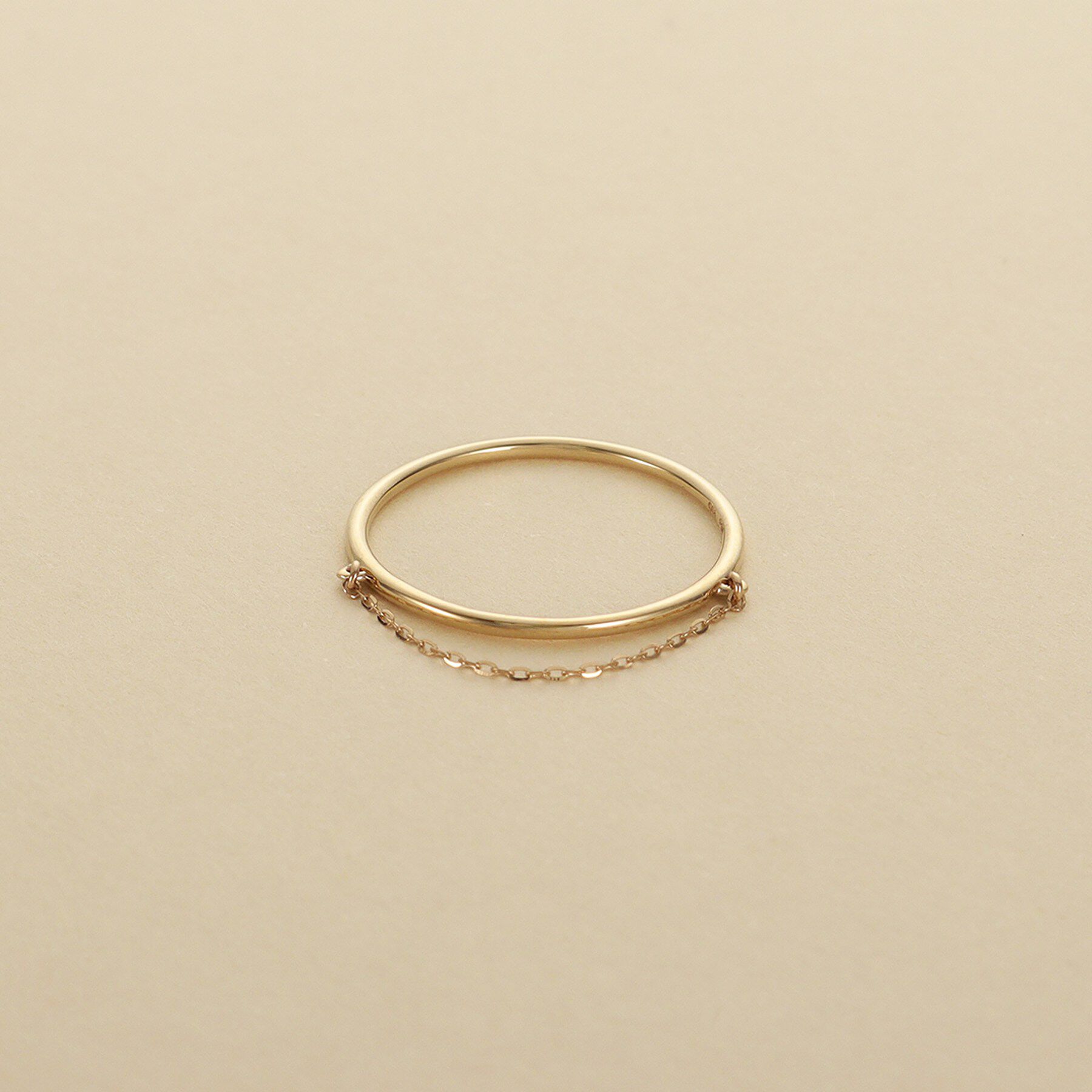 COCOSHNIK ONKITSCH「K10ミラーカットチェーン ドレープリング」|リング|