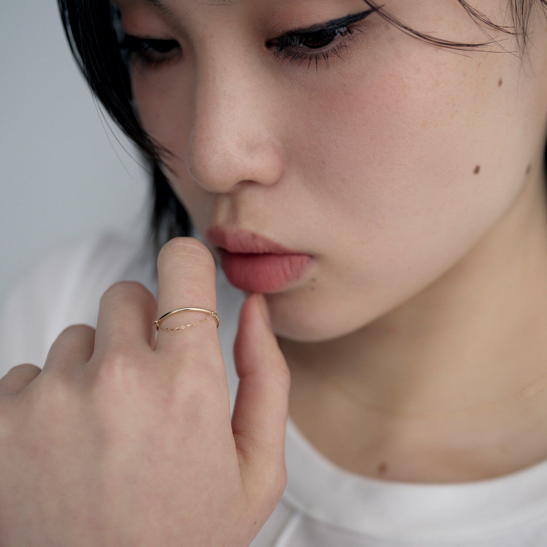 COCOSHNIK ONKITSCH「K10ミラーカットチェーン ドレープリング」|リング|