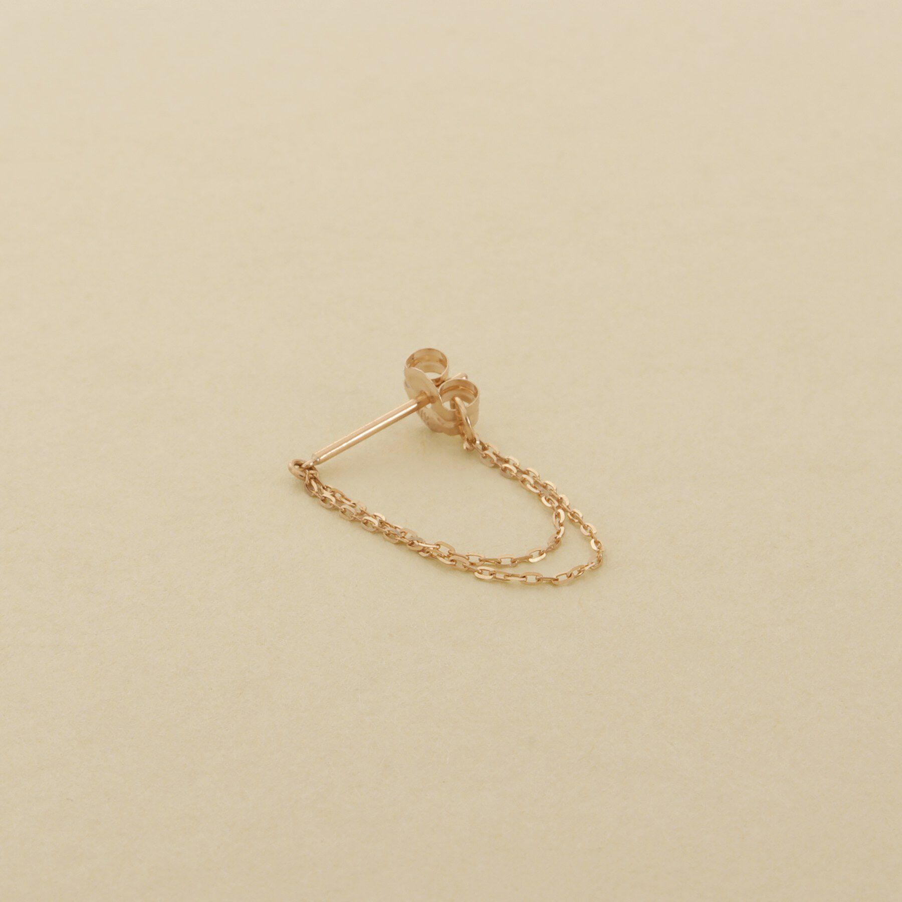 COCOSHNIK ONKITSCH「K10ミラーカットチェーン ドレープフープピアス」|ピアス|