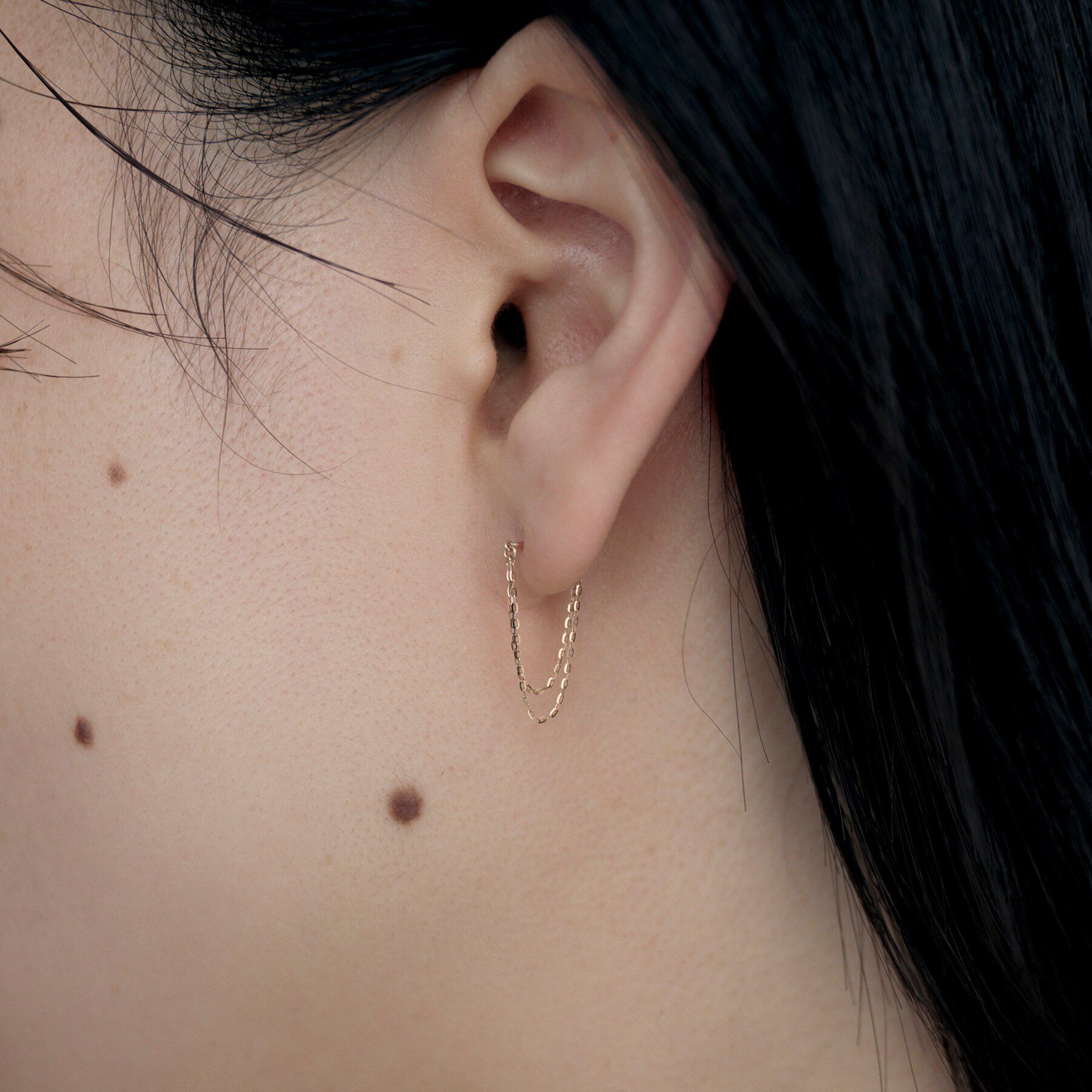 COCOSHNIK ONKITSCH「K10ミラーカットチェーン ドレープフープピアス」|ピアス|