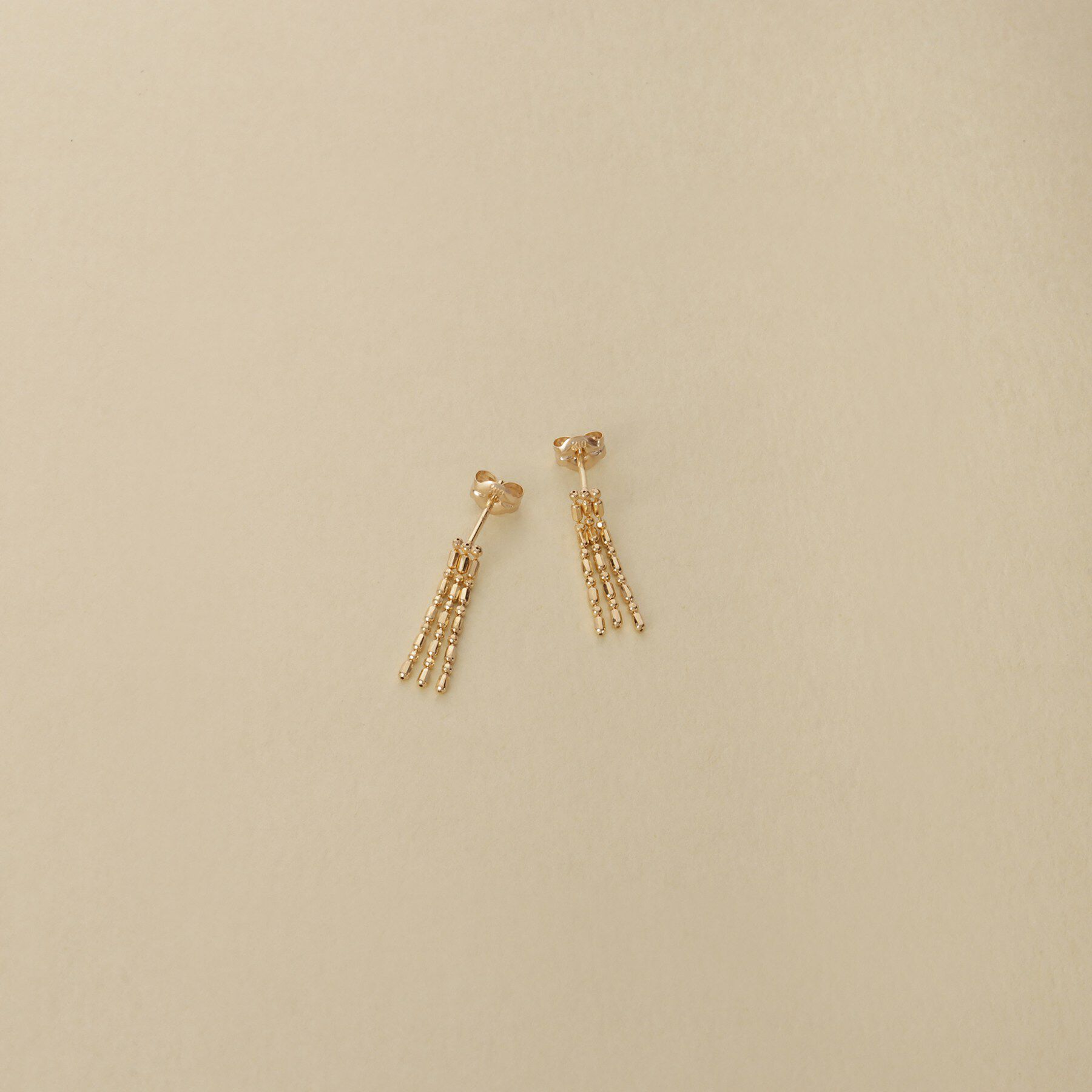 COCOSHNIK ONKITSCH「K10シリンダーチェーン フリンジピアス」|ピアス|イエローゴールド(1