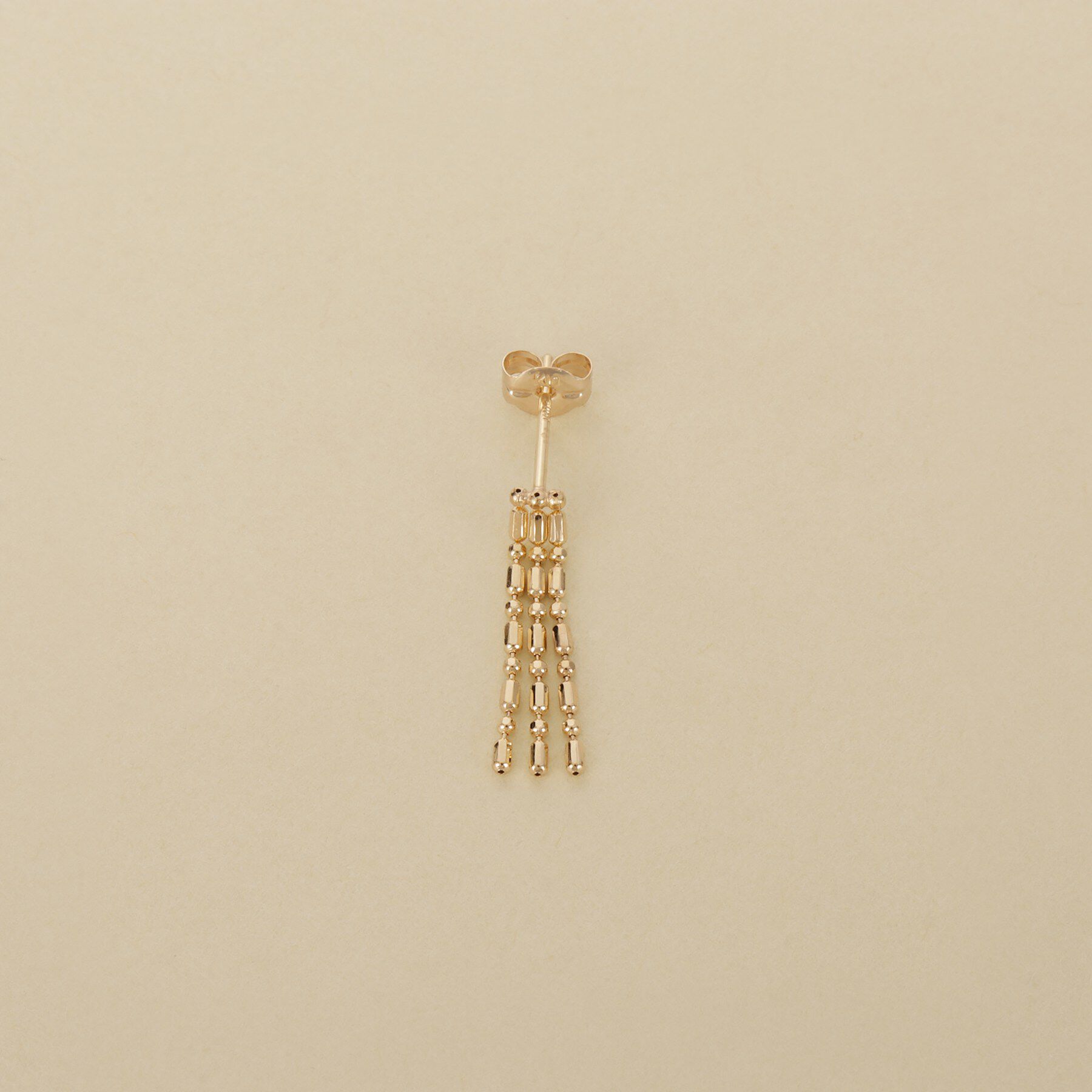 COCOSHNIK ONKITSCH「K10シリンダーチェーン フリンジピアス」|ピアス|