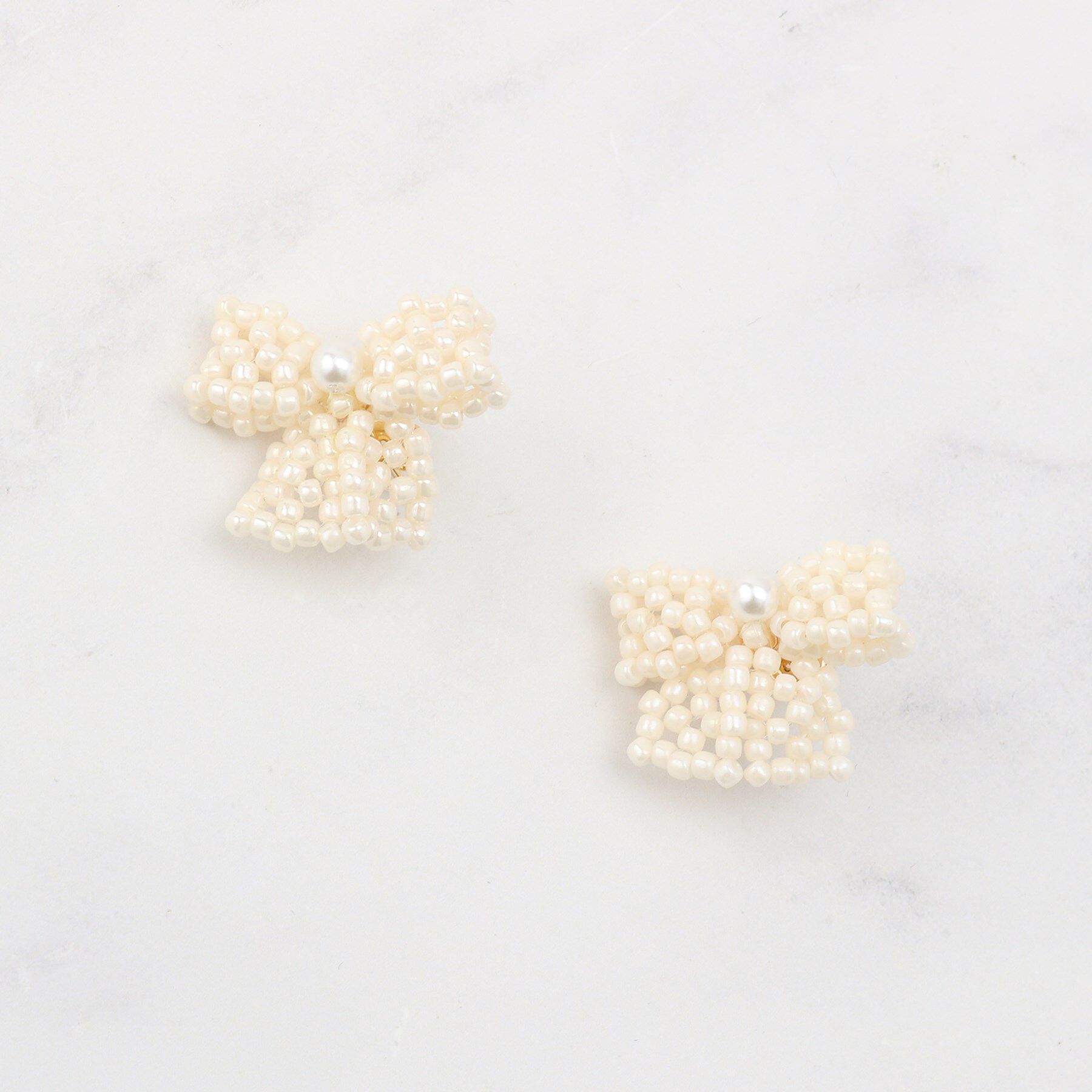 Couture broach「パール調リボンモチーフピアス」|ピアス|ゴールド(007)