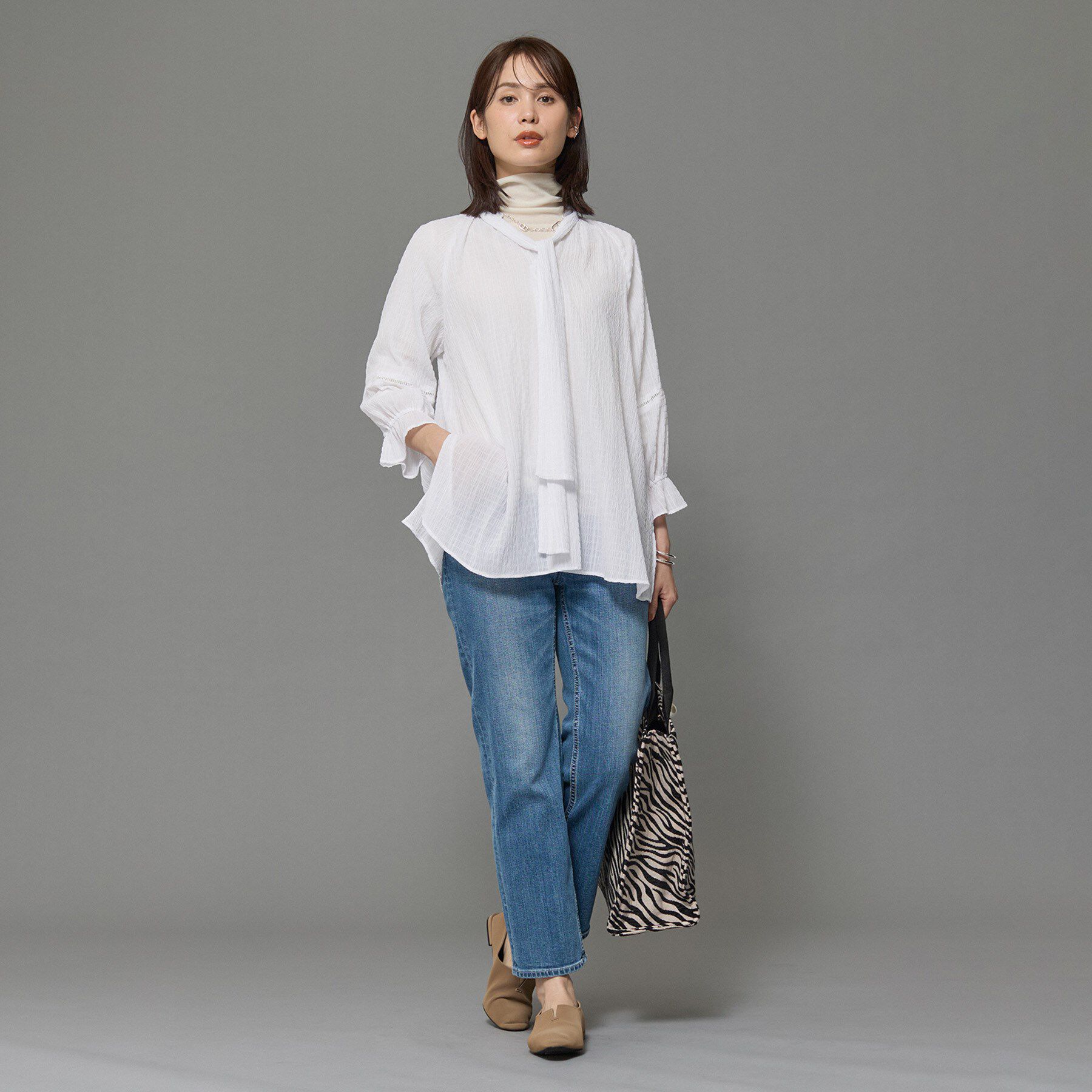 INDIVI「【洗える／シャーリング素材】ボリューム袖エアリーブラウス」|シャツ・ブラウス|