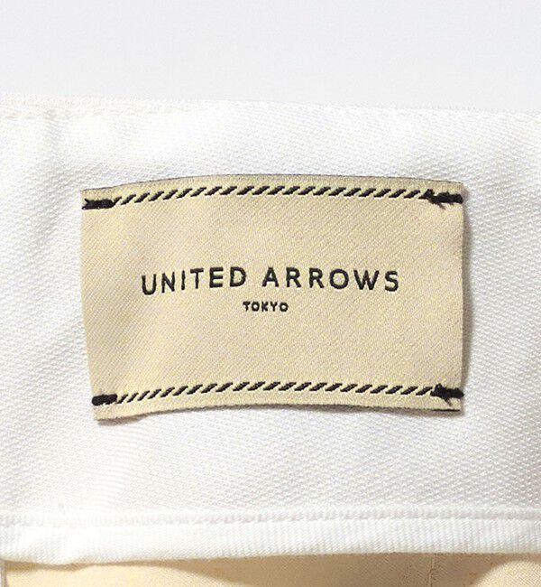 UNITED ARROWS「シャイニー スリム パンツ WHITE ‐ストレッチ ウォッシャブル‐」|スラックス|