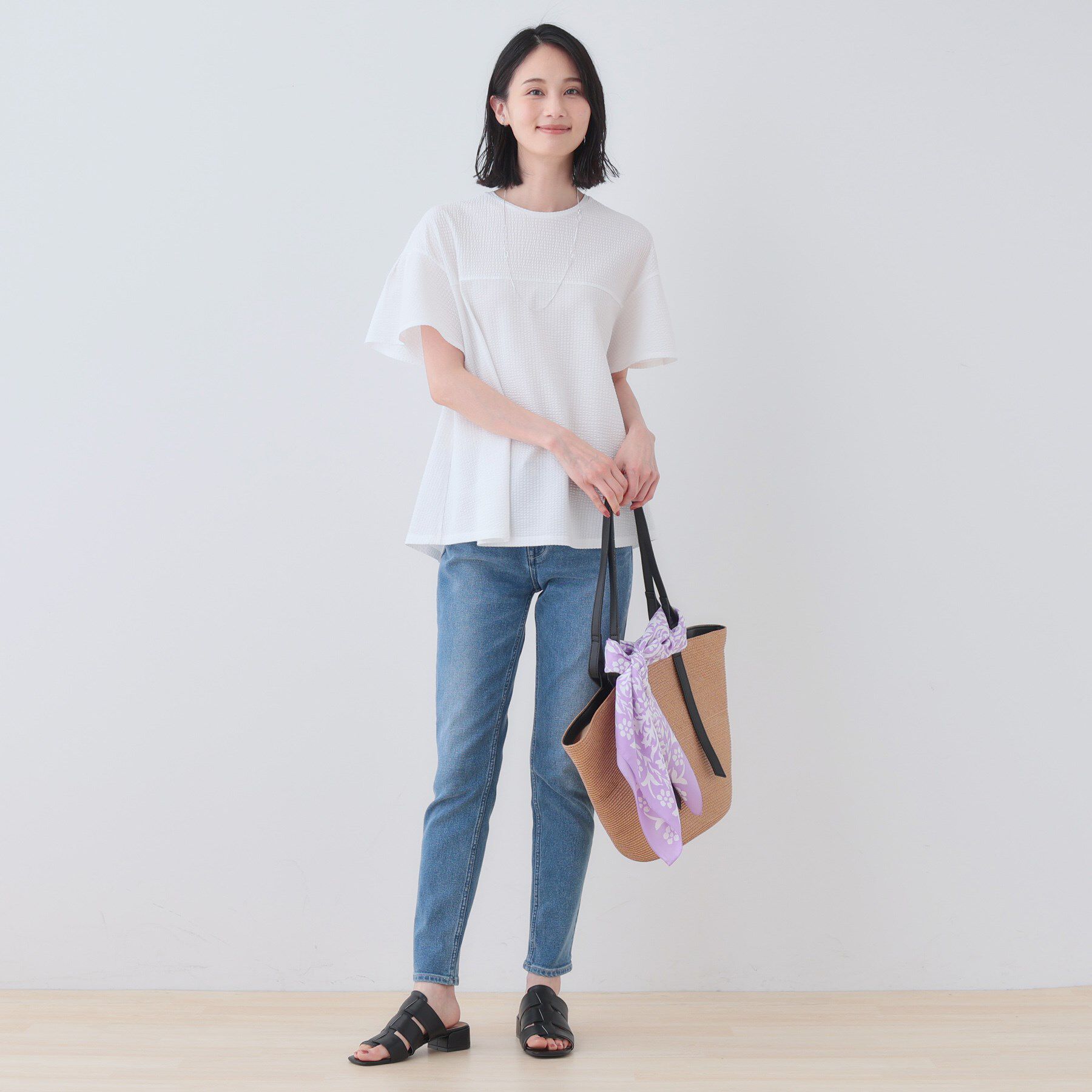 INDIVI「【洗える／体型カバー】凹凸素材フレアデザイントップス」|Tシャツ・カットソー|