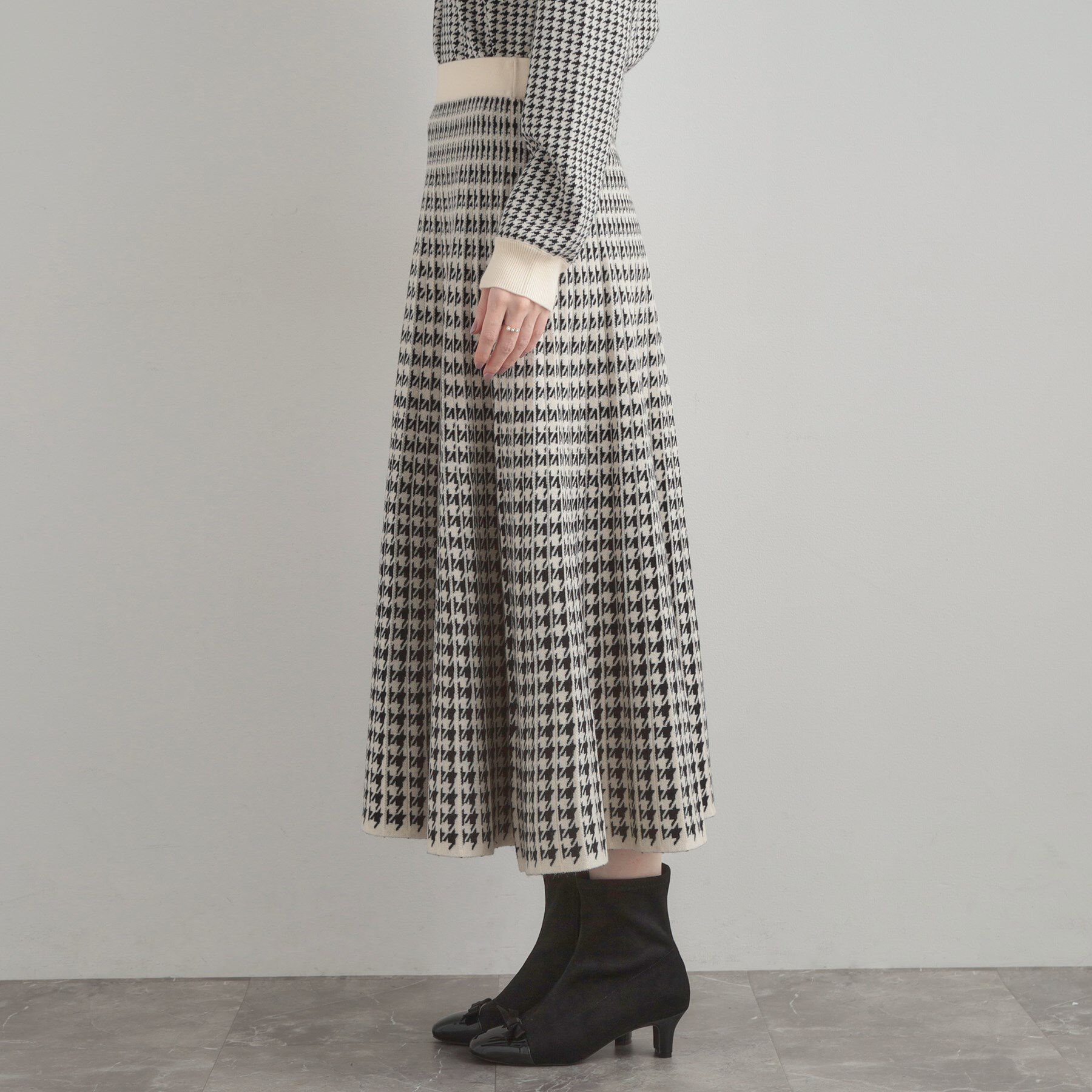 Couture broach「【クラシカル・大人上品】千鳥ジャカードニットプリーツスカート」|スカート|