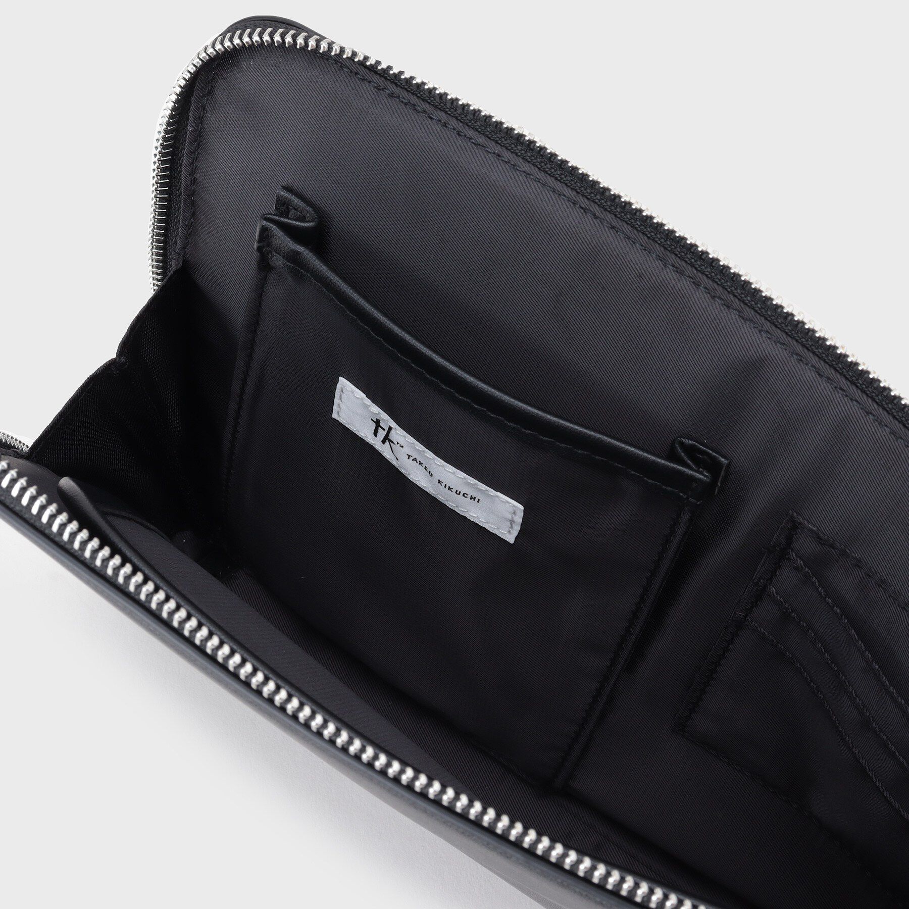 tk.TAKEO KIKUCHI「切替ZIPクラッチバッグ」|クラッチバッグ|