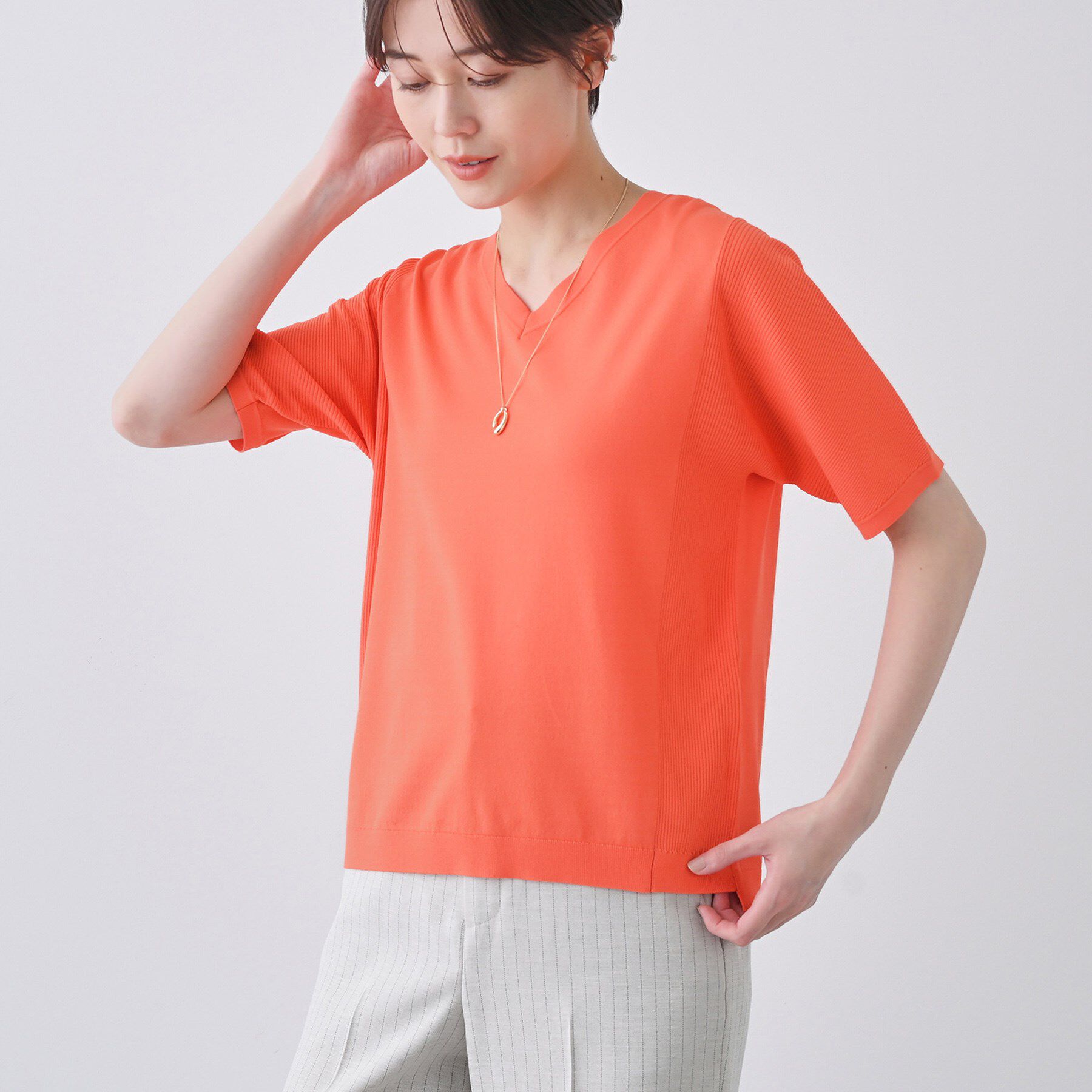 INDIVI「【洗える／清涼感】レーヨンストレッチ 安心丈の半袖ニット」|ニット・セーター|オレンジ(067)