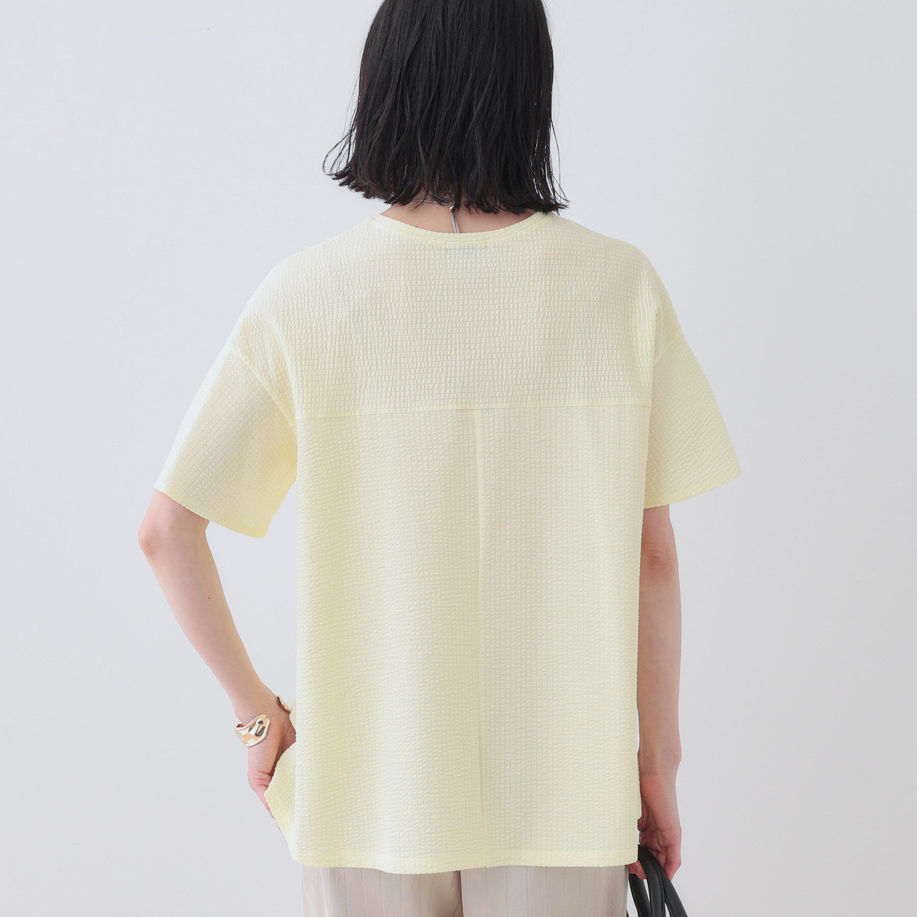 INDIVI「【洗える／体型カバー】凹凸素材フレアデザイントップス」|Tシャツ・カットソー|