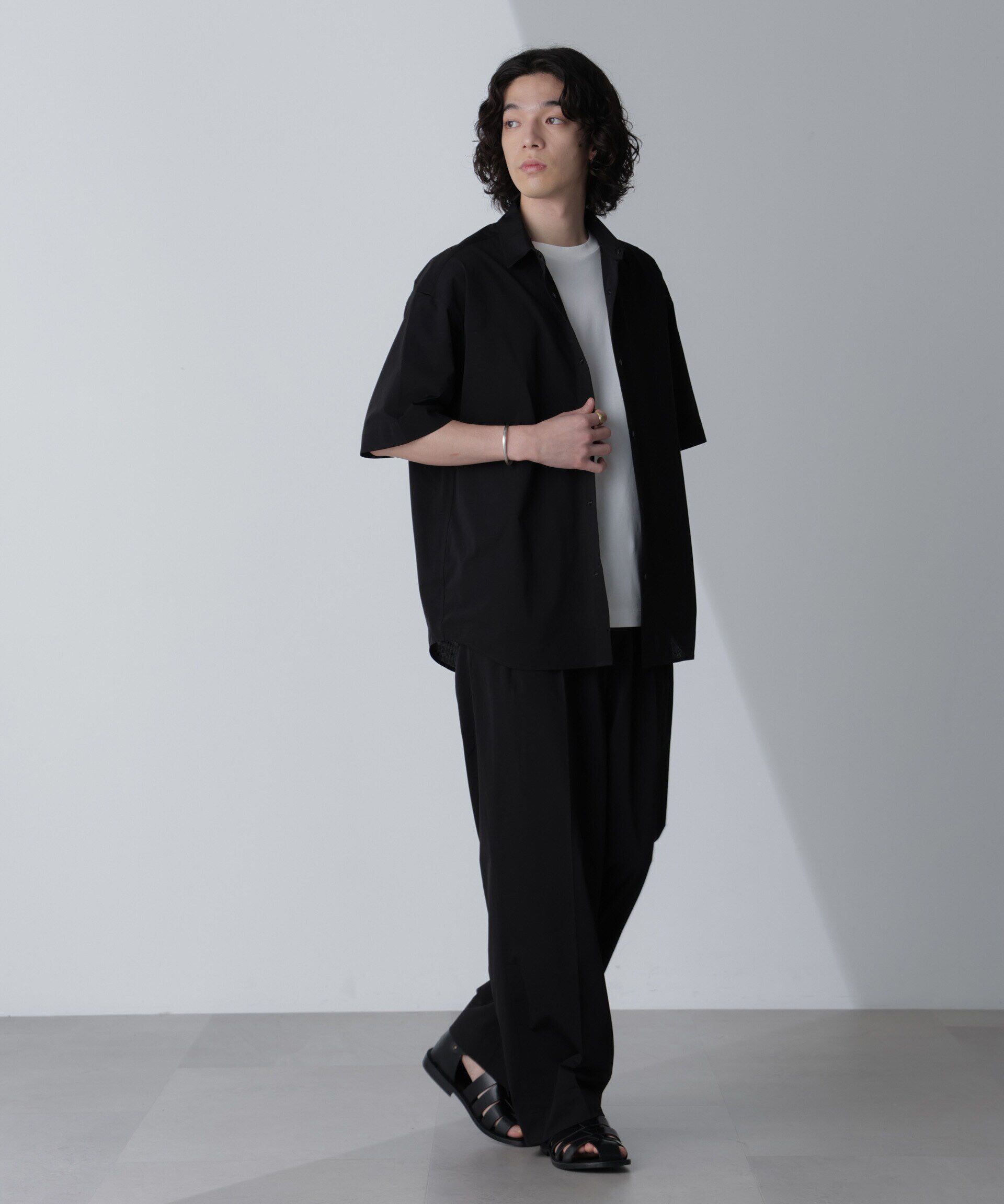 nano･universe「「AIR PASSAGE」テーパードイージーパンツ（セットアップ可）」|チノ|ブラック