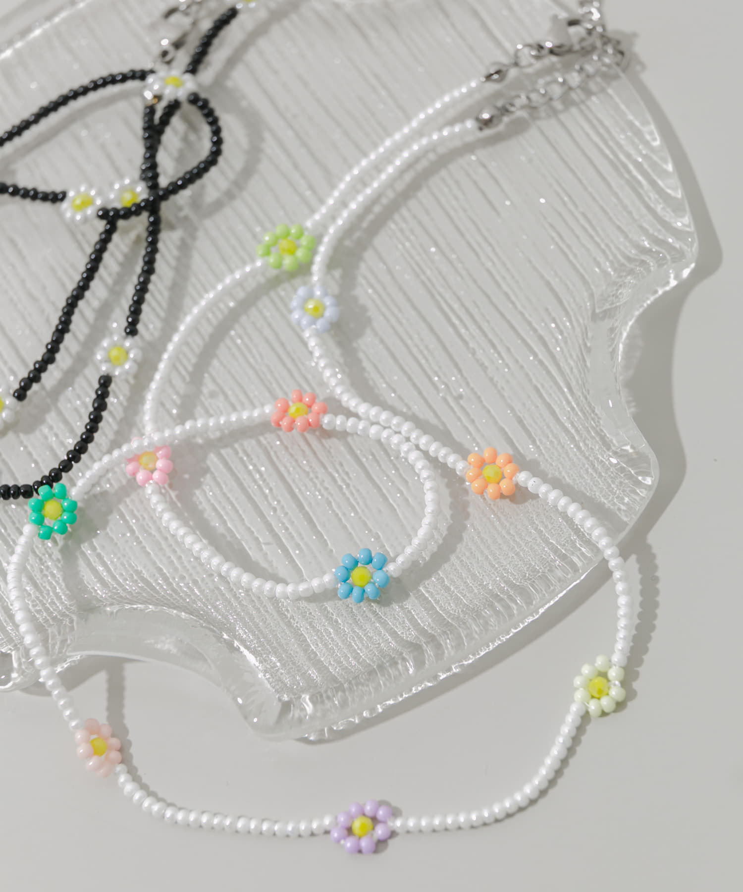 SMELLY「ステンレスフラワーモチーフビーズネックレス」|ネックレス|