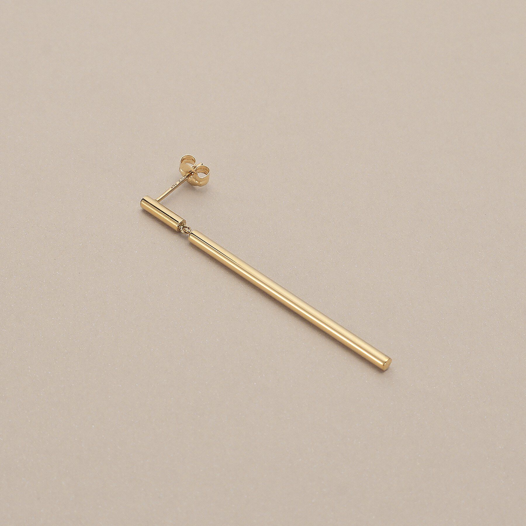 COCOSHNIK「K10中空バースウィング スタッドピアス」|ピアス|