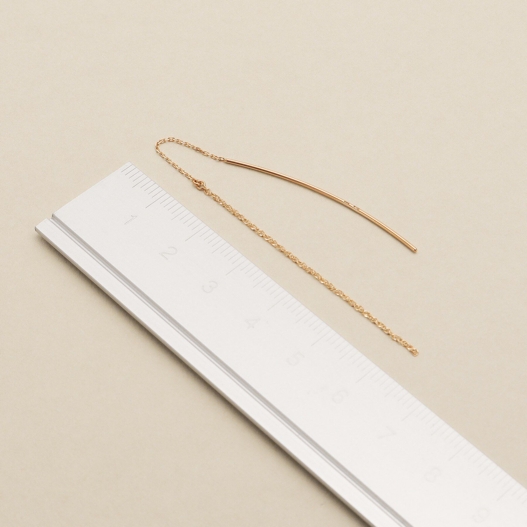 COCOSHNIK ONKITSCH「K10アーチバー スクリューチェーンピアス」|ピアス|