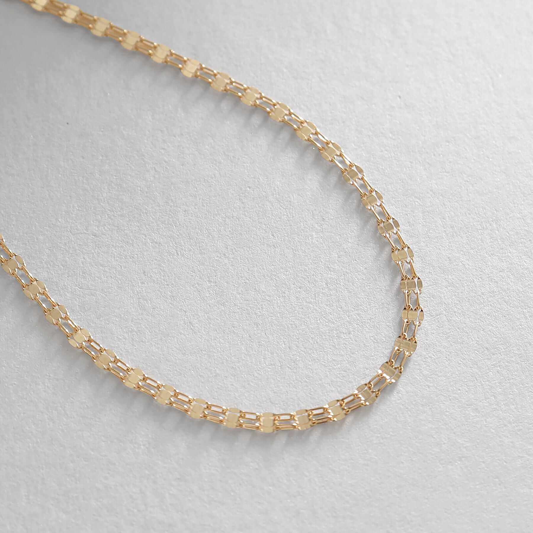 COCOSHNIK「K18ダブルフラワークロス ブレスレット」|ブレスレット・バングル|