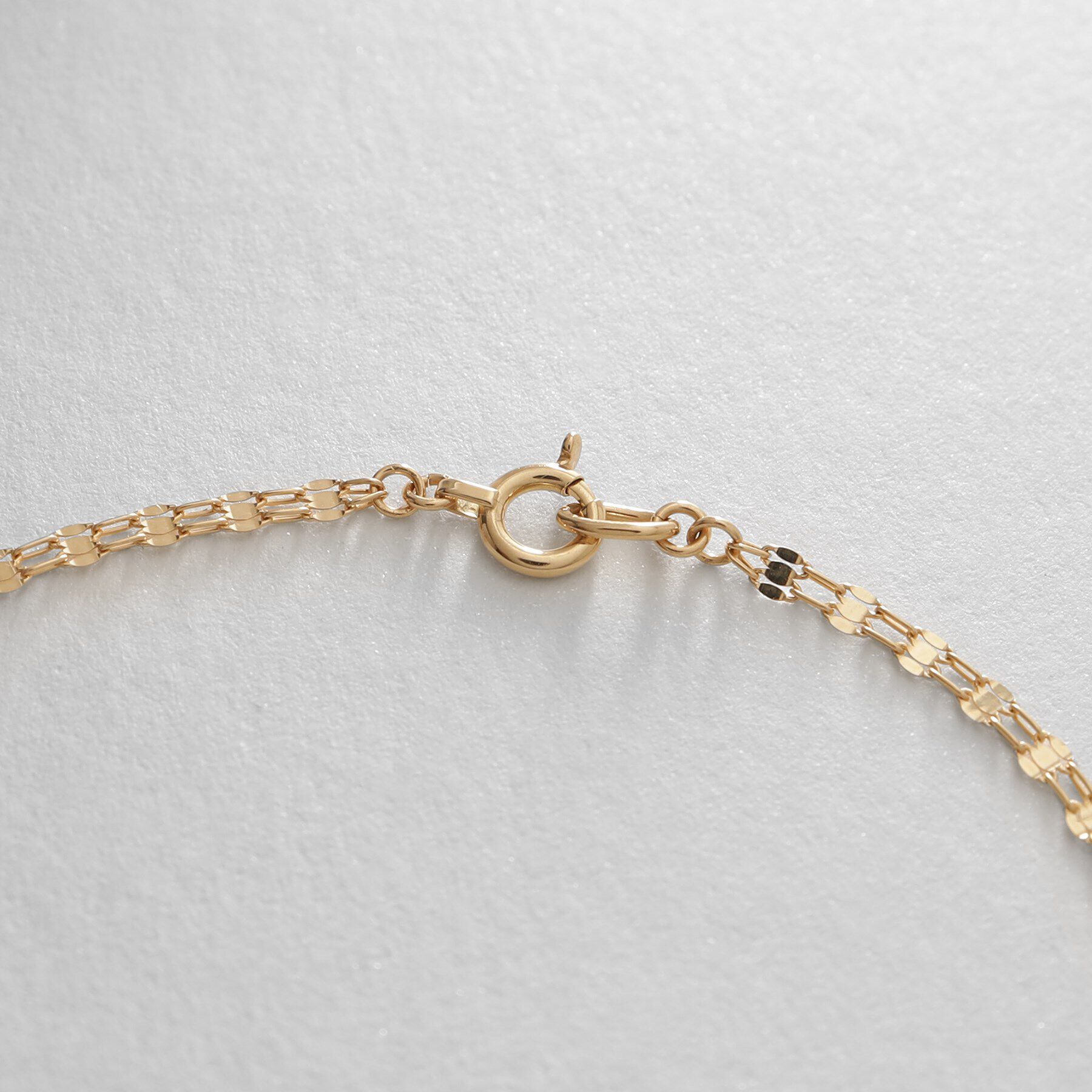 COCOSHNIK「K18ダブルフラワークロス ブレスレット」|ブレスレット・バングル|