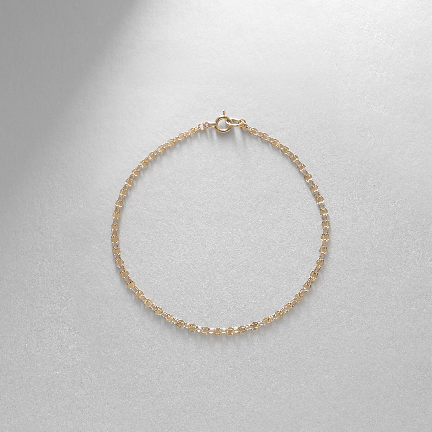 COCOSHNIK「K18ダブルフラワークロス ブレスレット」|ブレスレット・バングル|