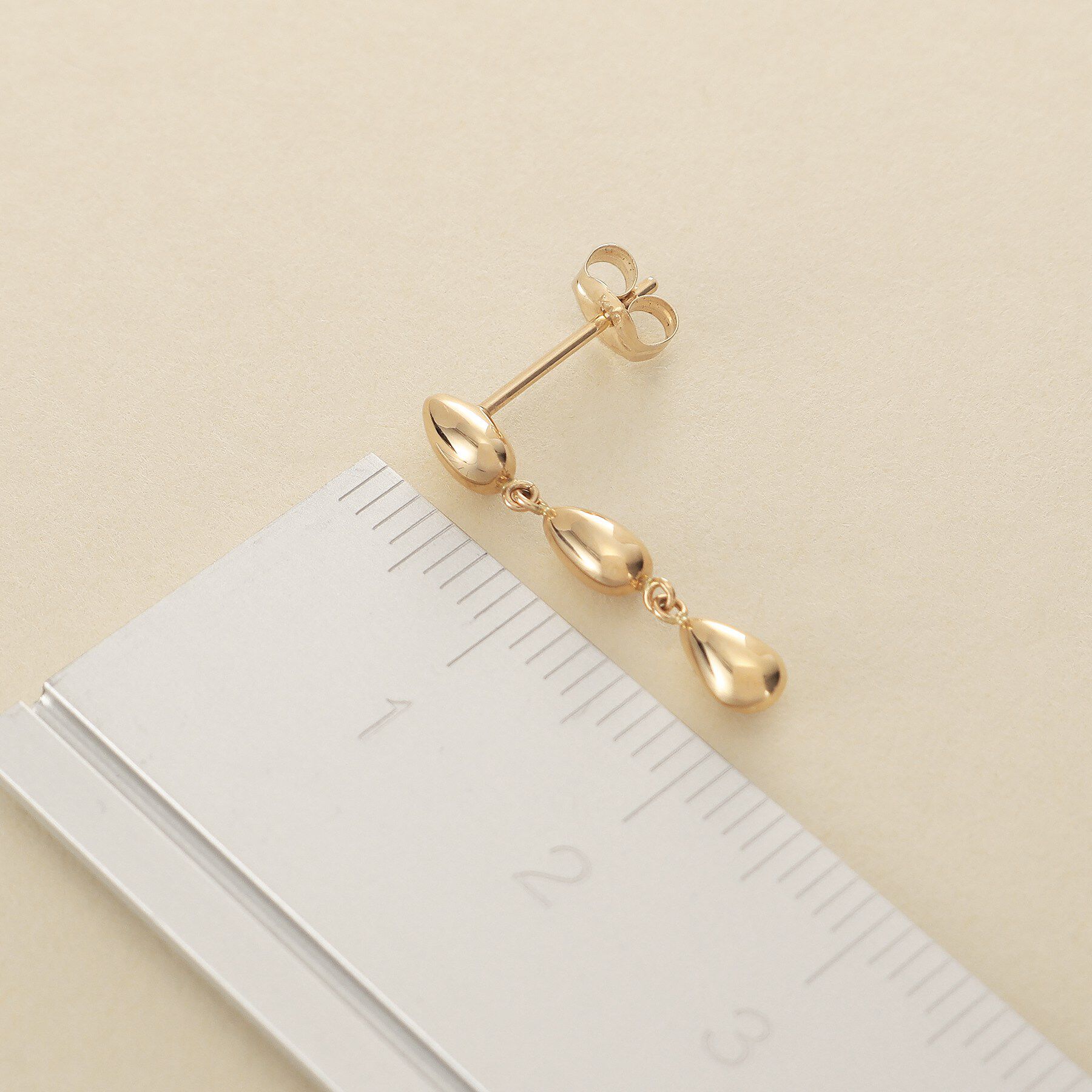 COCOSHNIK ONKITSCH「K10ホロウトリプルペアシェイプピアス」|ピアス|