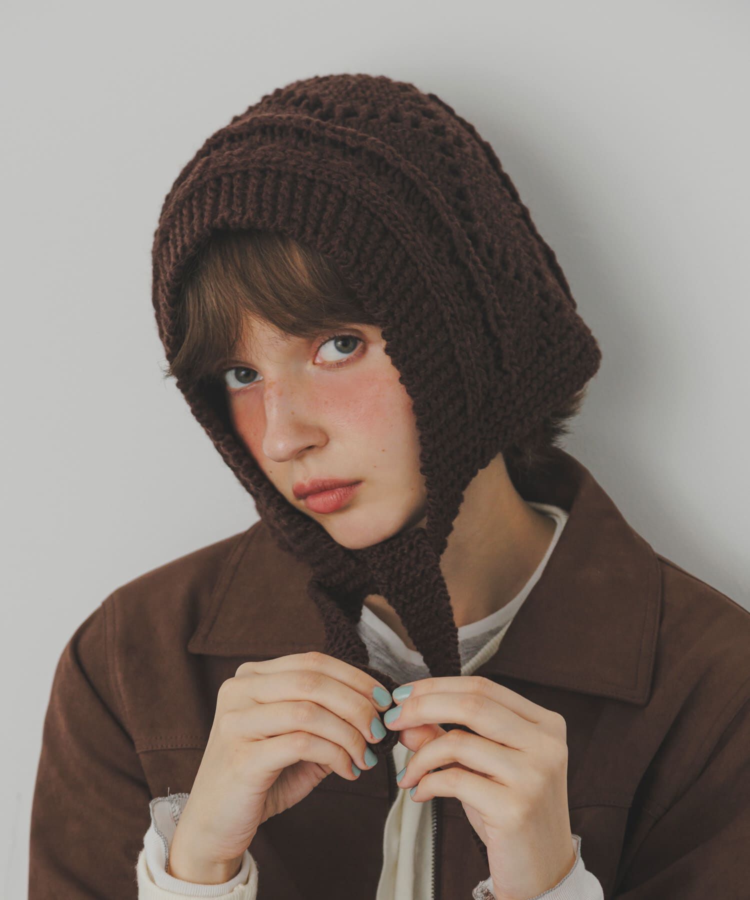 SMELLY「ケーブルアミボンネット」|ニット帽|ブラウン