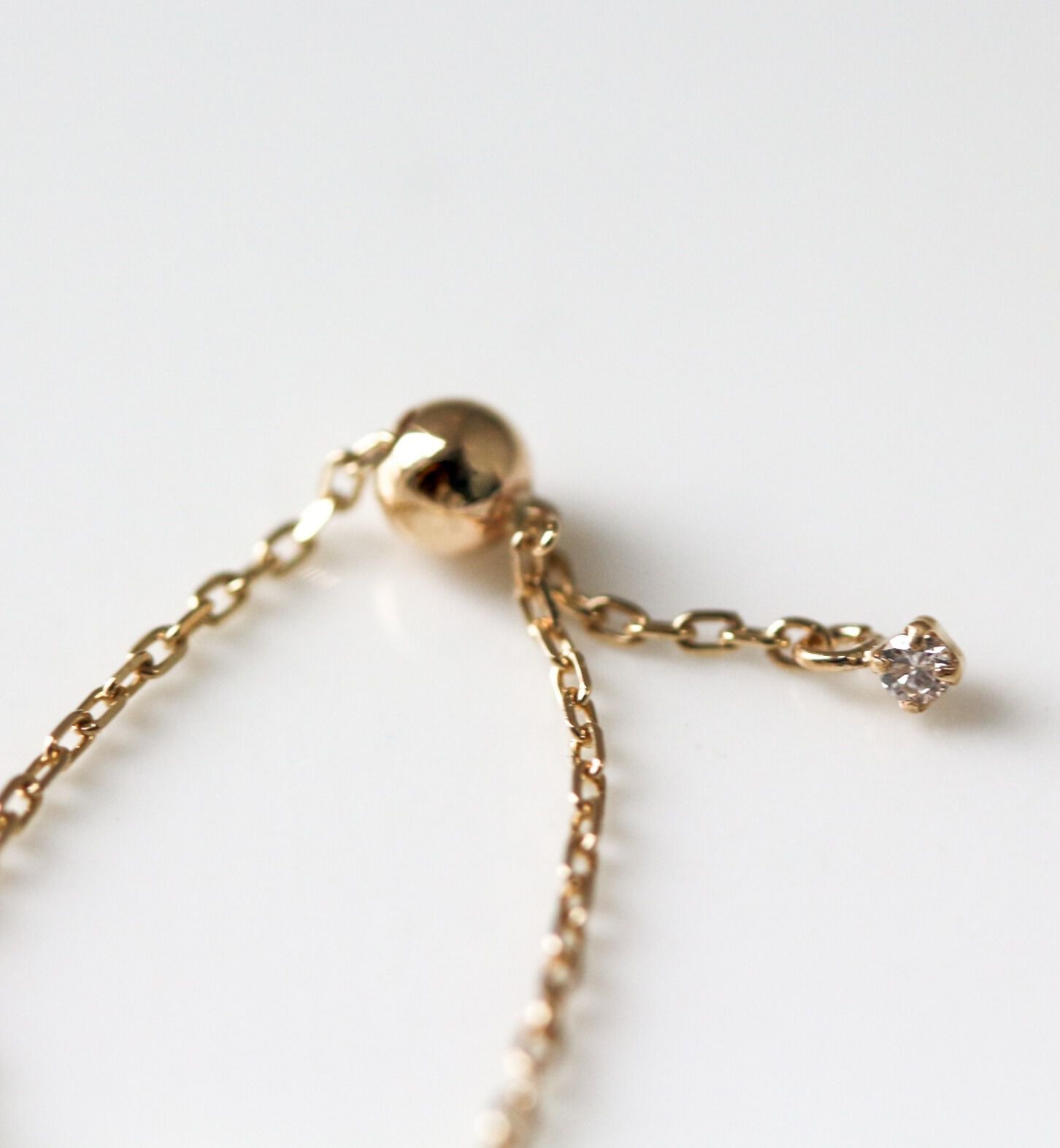  「ダイヤモンド ステーション チェーンリング | K10YG」|リング|