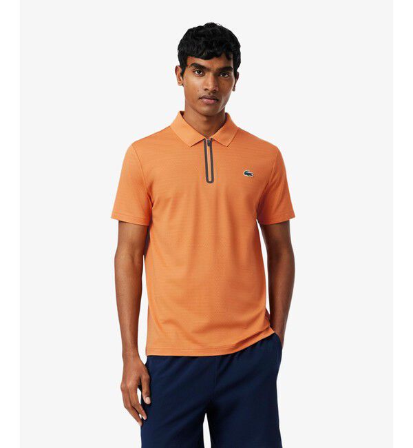 LACOSTE「ウルトラドライ コートジャカードジップポロシャツ」|ポロシャツ|オレンジ