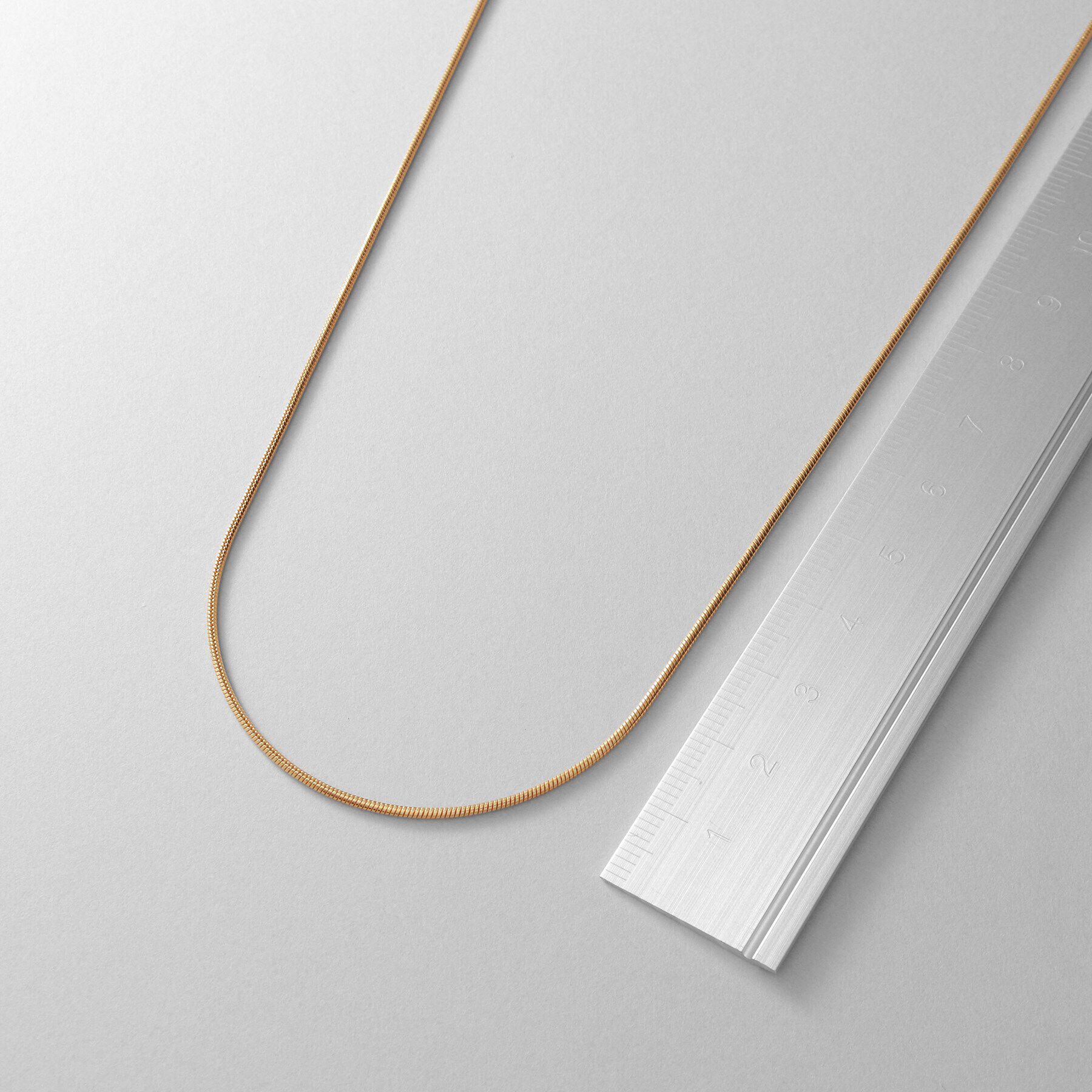 COCOSHNIK ONKITSCH「シルバー デザインチェーン スネークネックレス（90cm） GP」|ネックレス|