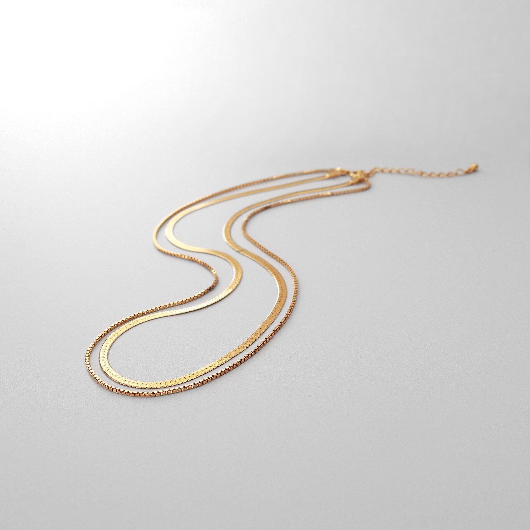 COCOSHNIK ONKITSCH「シルバー コンビネーションチェーン フラットスネーク ベネチアンネックレス GP」|ネックレス|ゴールド(600)
