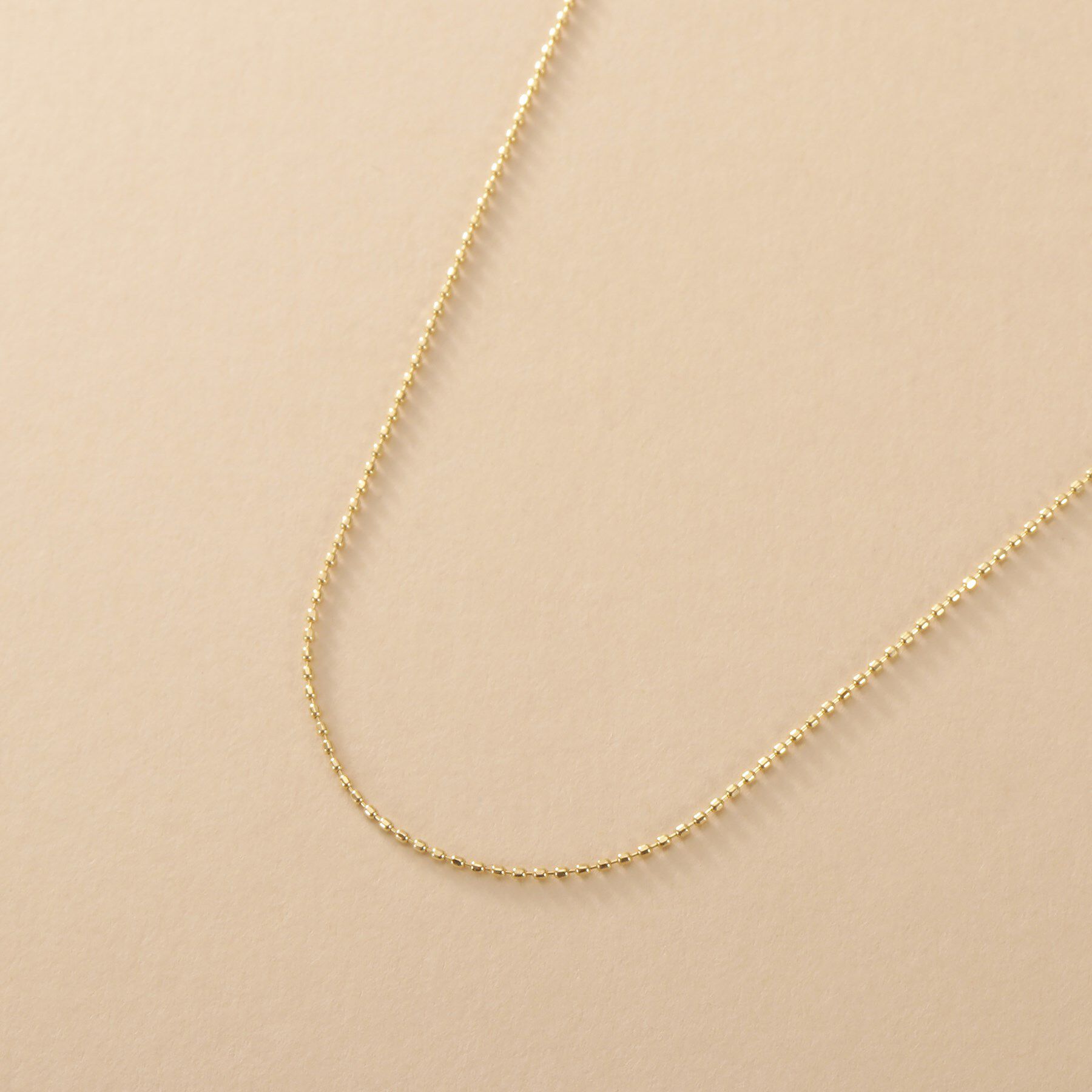 COCOSHNIK ONKITSCH「K10スキニーネックレス カットボール」|ネックレス|