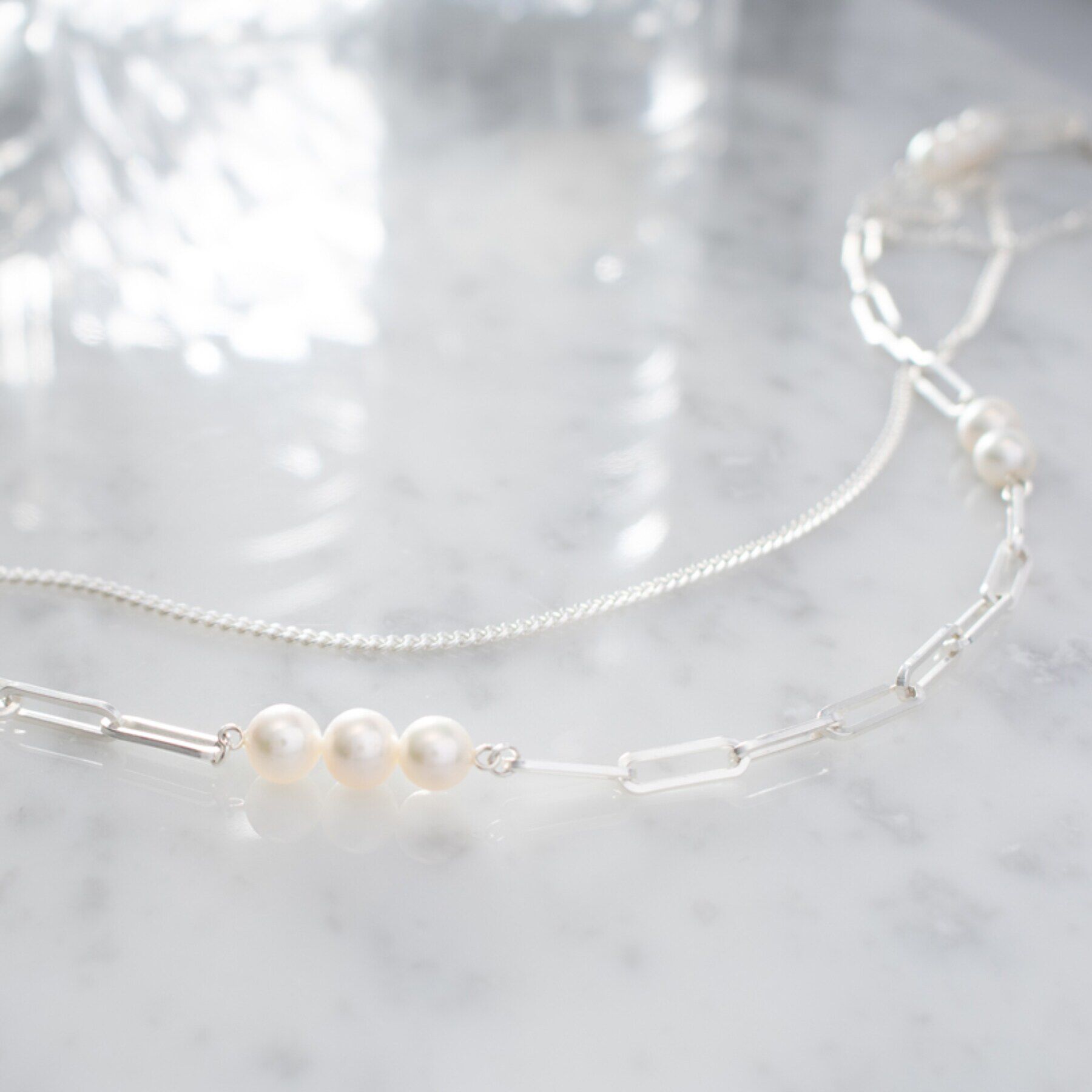 COCOSHNIK ONKITSCH「シルバー デザインチェーン カーブネックレス」|ネックレス|