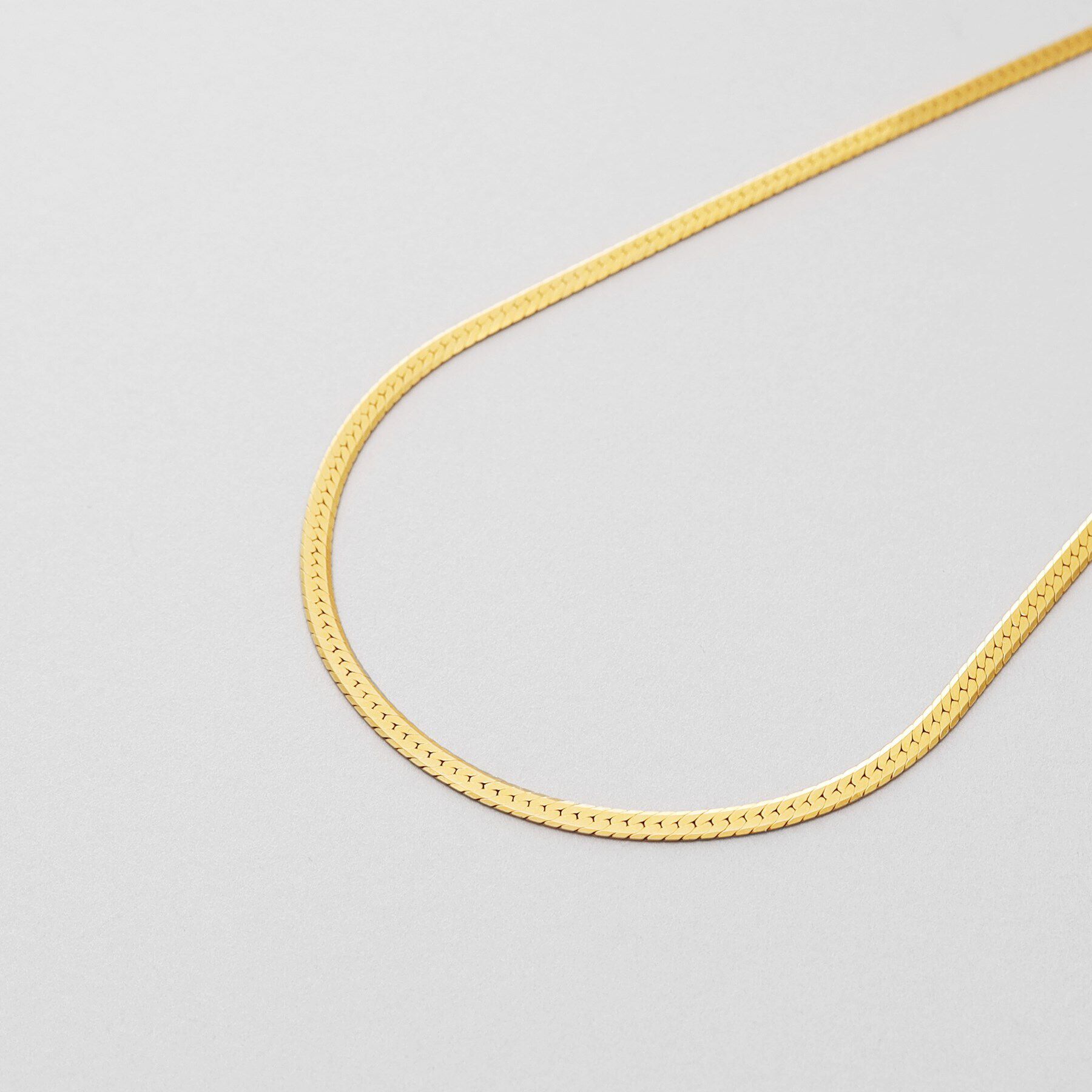 COCOSHNIK ONKITSCH「シルバー デザインチェーン フラットスネークネックレスM GP」|ネックレス|