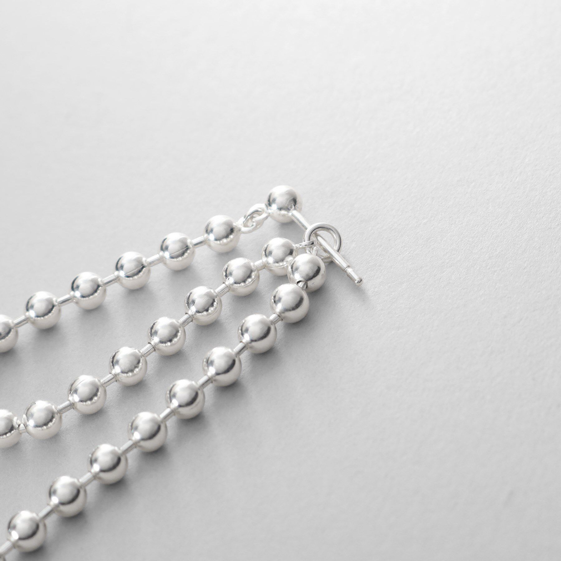 COCOSHNIK ONKITSCH「シルバー チェーンピアス ボールループ」|ピアス|