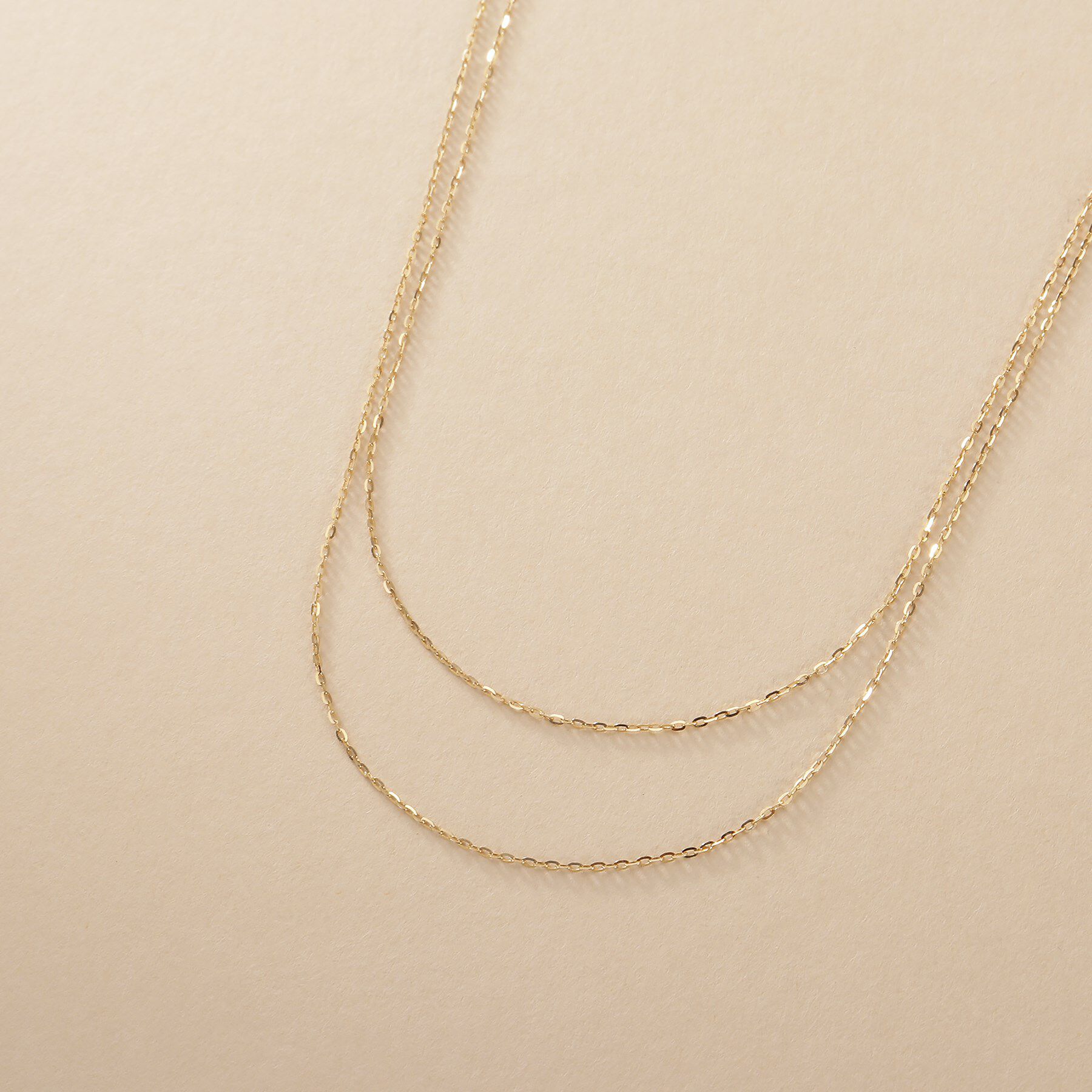 COCOSHNIK ONKITSCH「K10スキニードレープネックレス ミラーカット」|ネックレス|