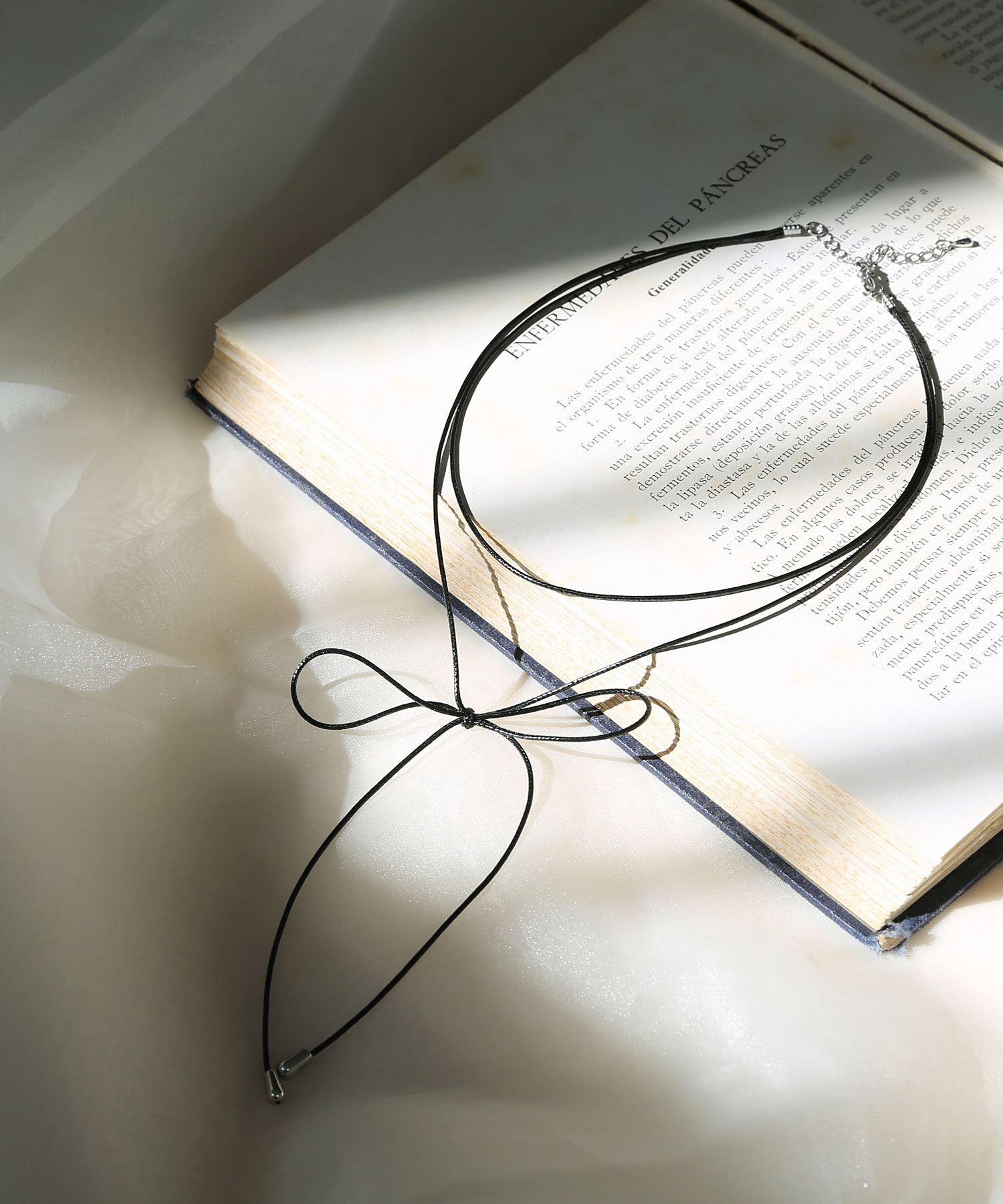 colleca la「2連リボンコードチョーカー」|ネックレス|ブラック