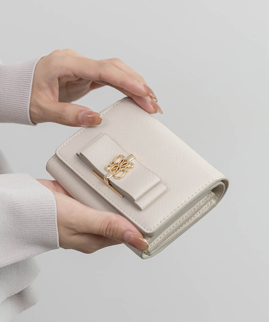 「モノグラムリボン二つ折りウォレット」|財布|アイボリー